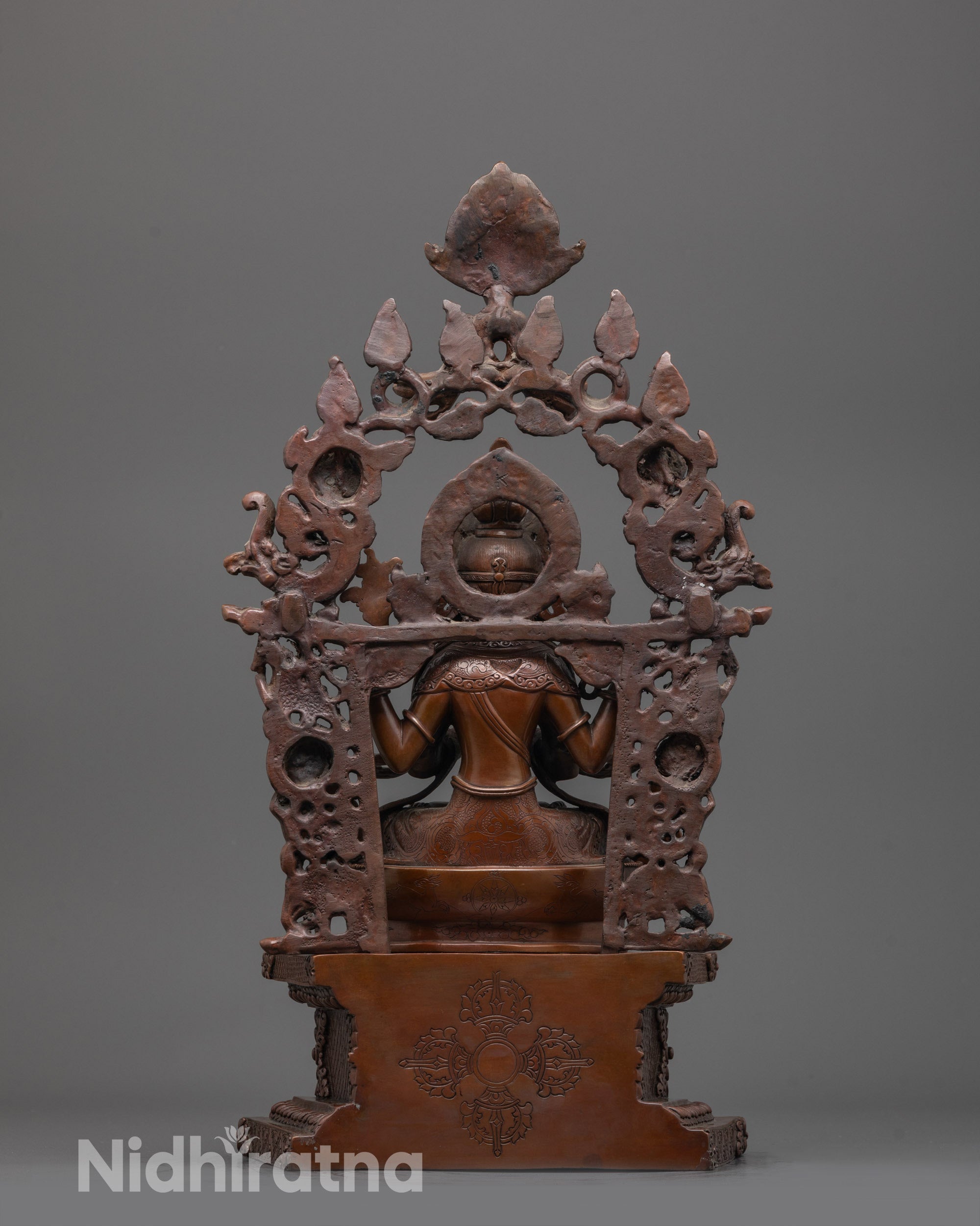 Back view of the Chenrezig Statue with visible hollow consecration chamber