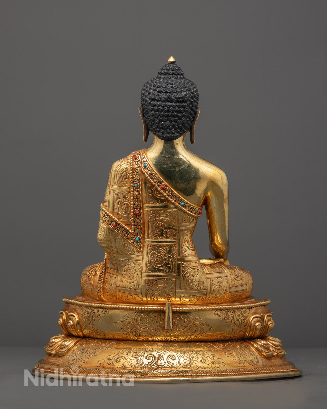 Shakyamuni Buddha statue revealing the sacred hollow chamber used for placing mantras, relics, or consecrated items.