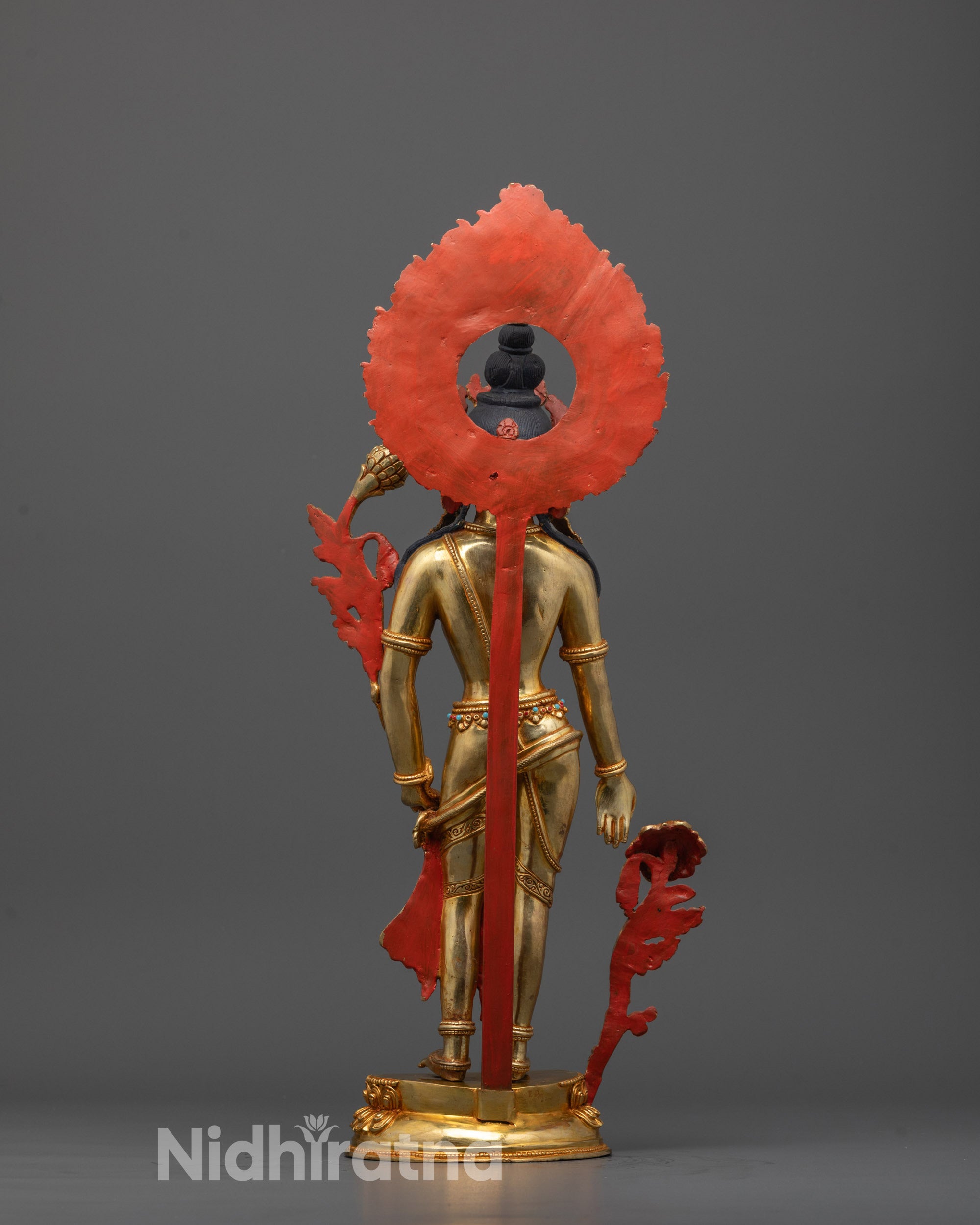 Back view of traditional Nepalese Padmapani Statue highlighting handcrafted details