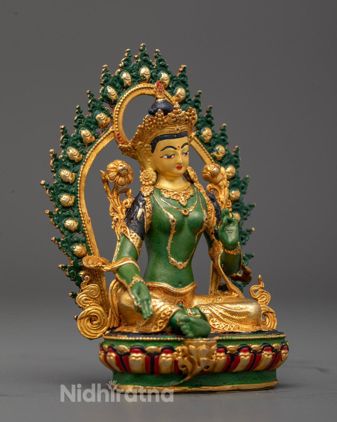 Beautiful Green Tara statue seated in royal ease pose symbolizing compassion protection and spiritual blessing