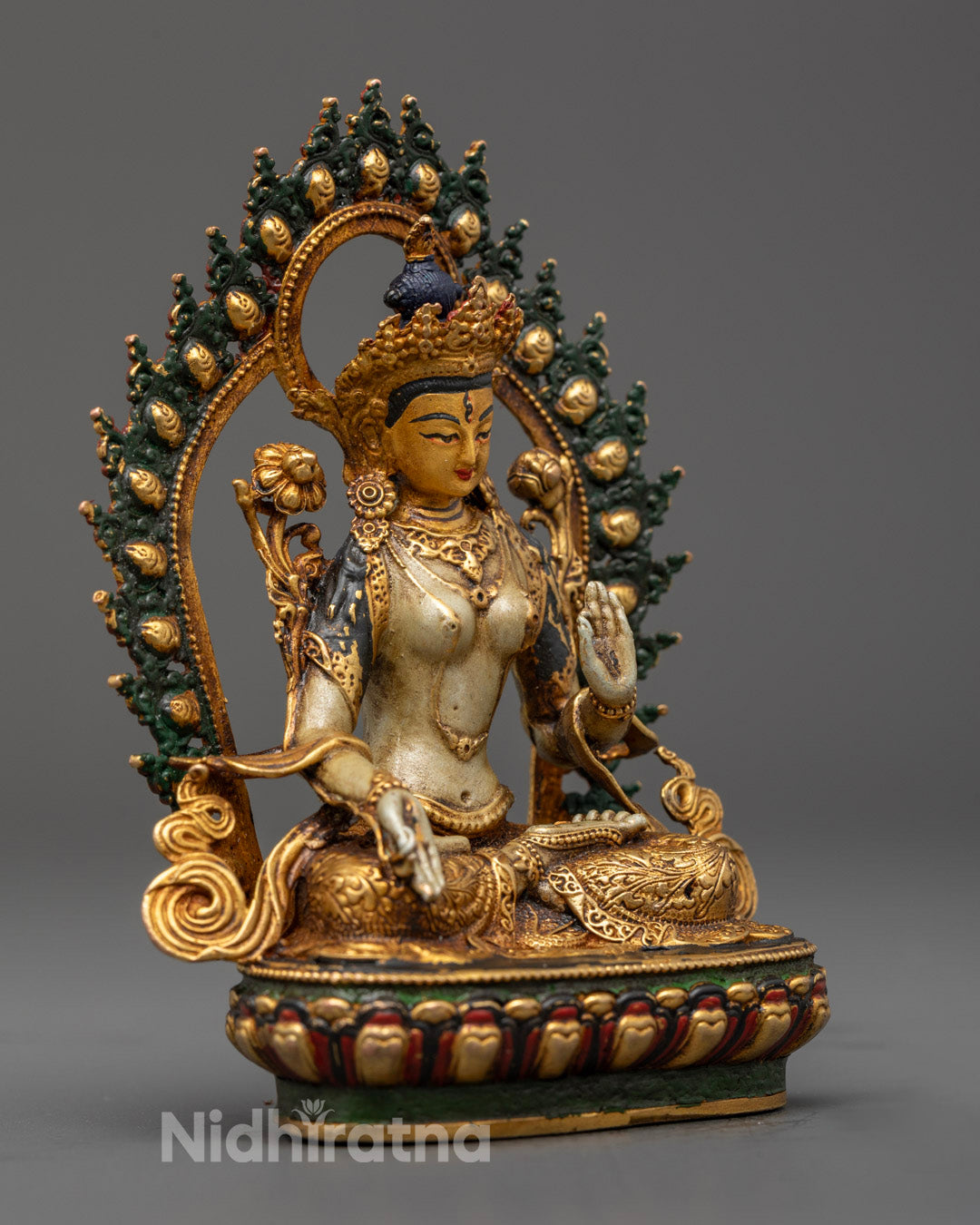 Beautifully crafted White Tara statue highlighting detailed jewelry, crown, robe carvings, and rich colors perfect for meditation and spiritual healing