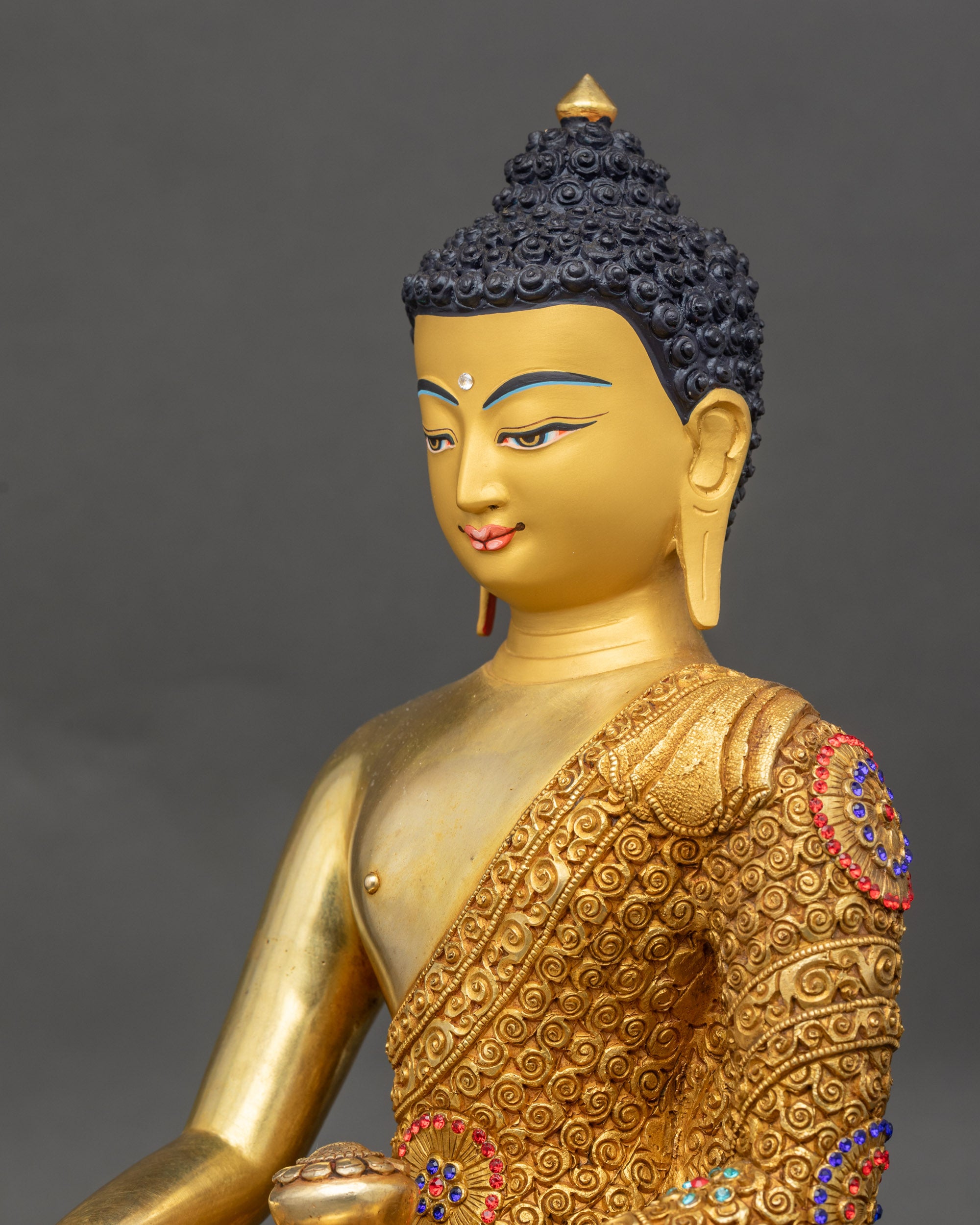 Buddha side close up intricate robes 3D floral carvings Nepalese art