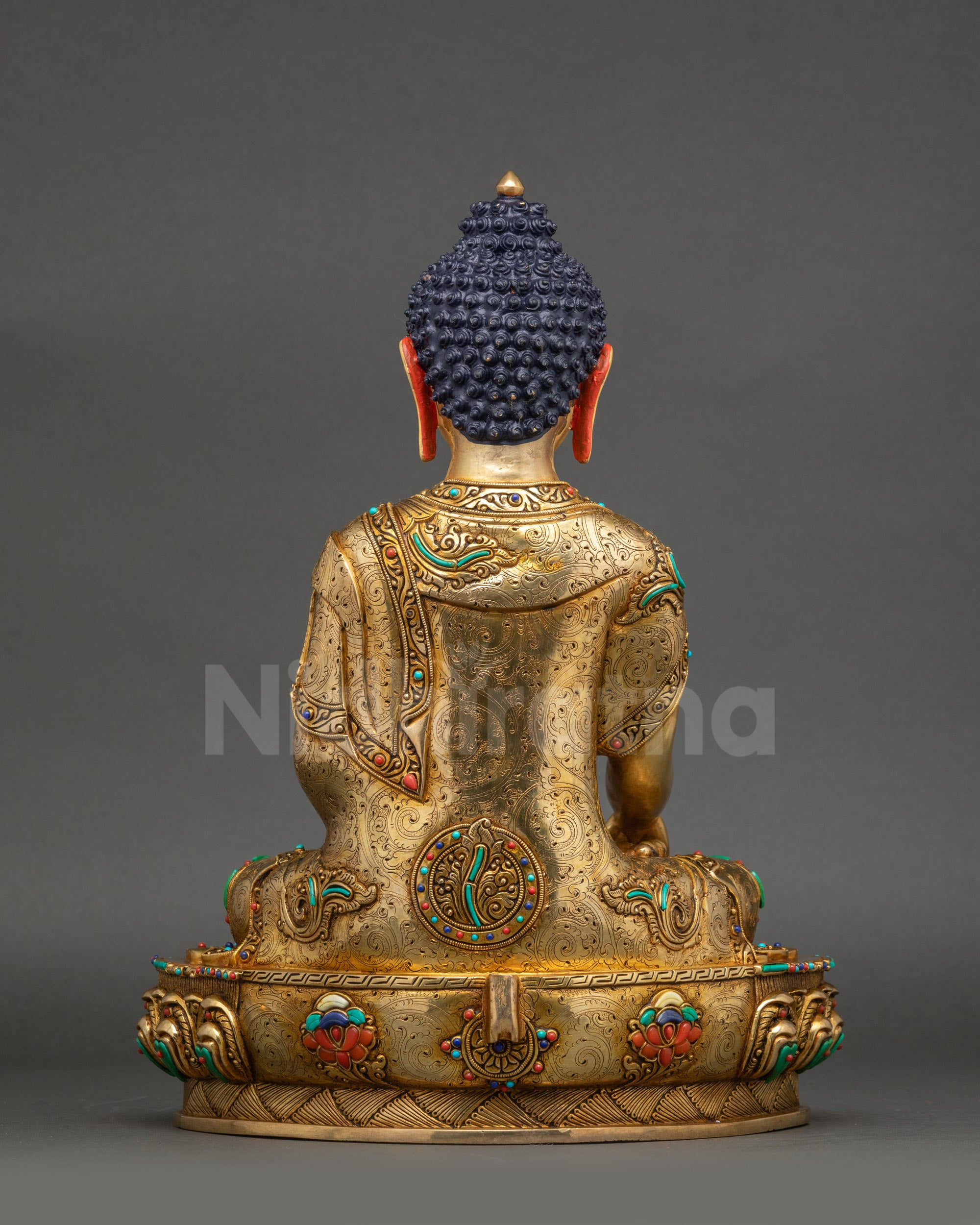 Buddha statue back view copper gold-gilded intricate carvings Nepal