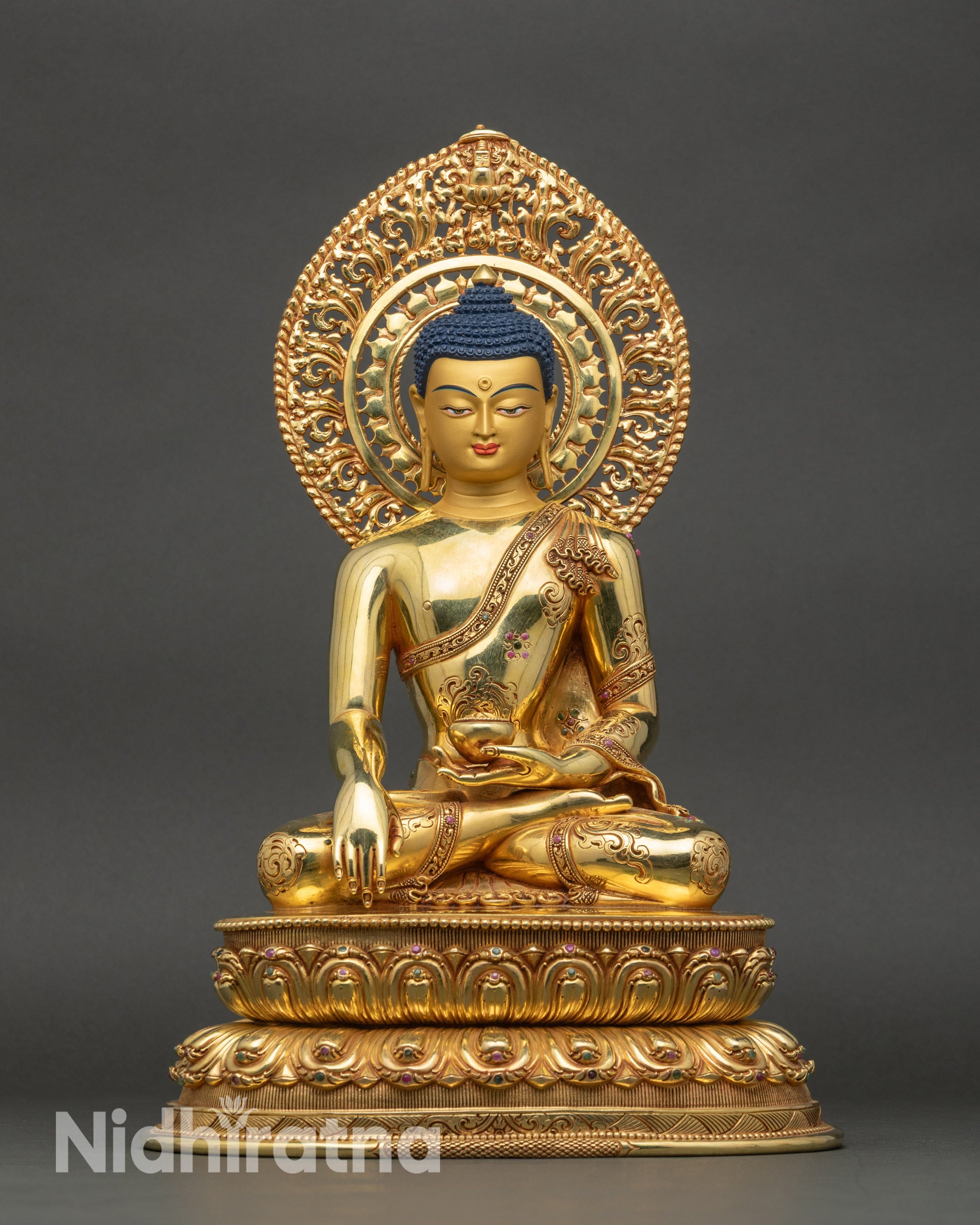 Buddha statue front view, handcrafted Nepalese copper and gold meditation idol