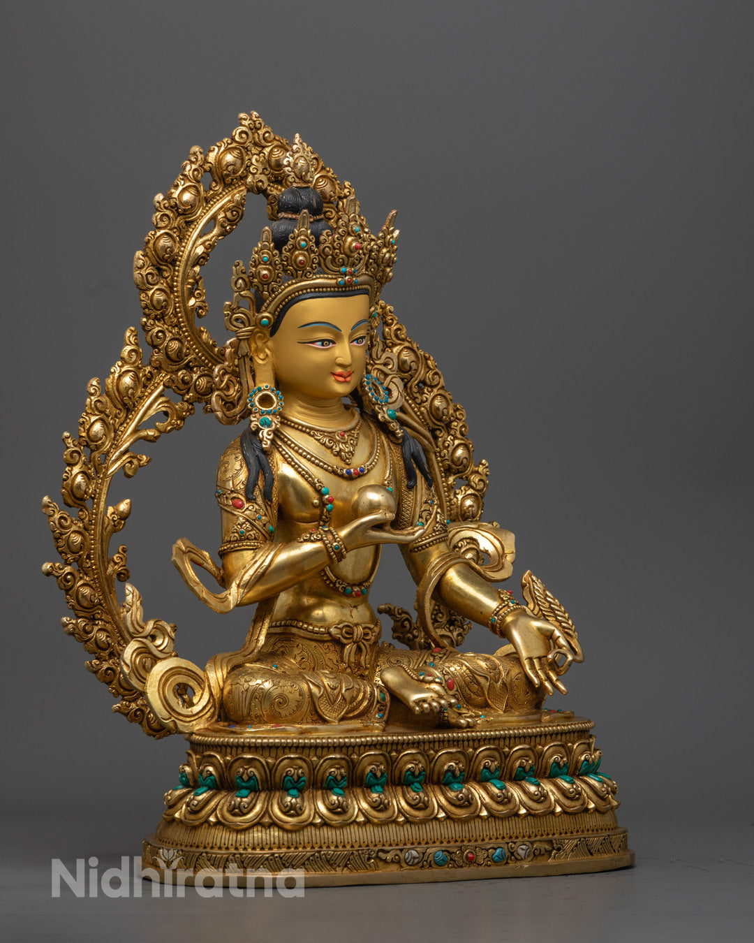 Buddhist Ksitigarbha Statue with detailed crown, robe, jewelry, and halo, symbolizing protection and compassion