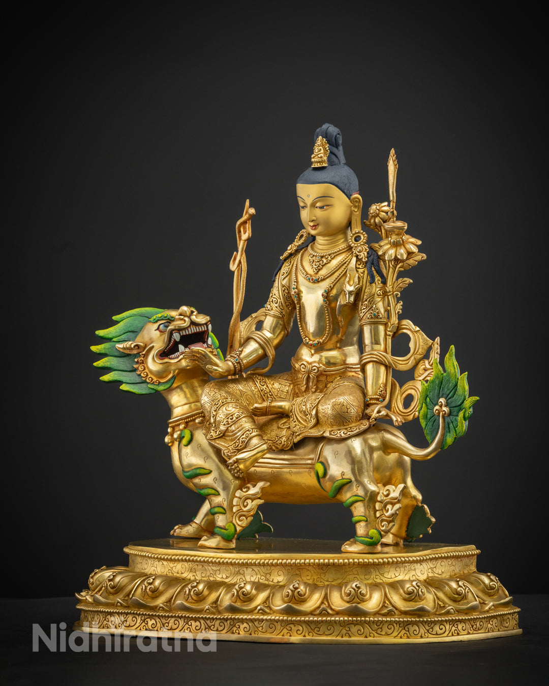 Avalokiteshvara statue in a Patan workshop, illustrating the traditional handmade process.