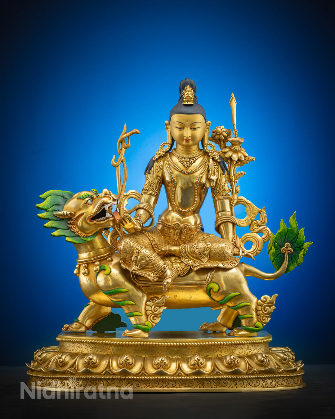 Avalokiteshvara statue gilded in 24K gold, displaying intricate detailing and a serene facial expression.