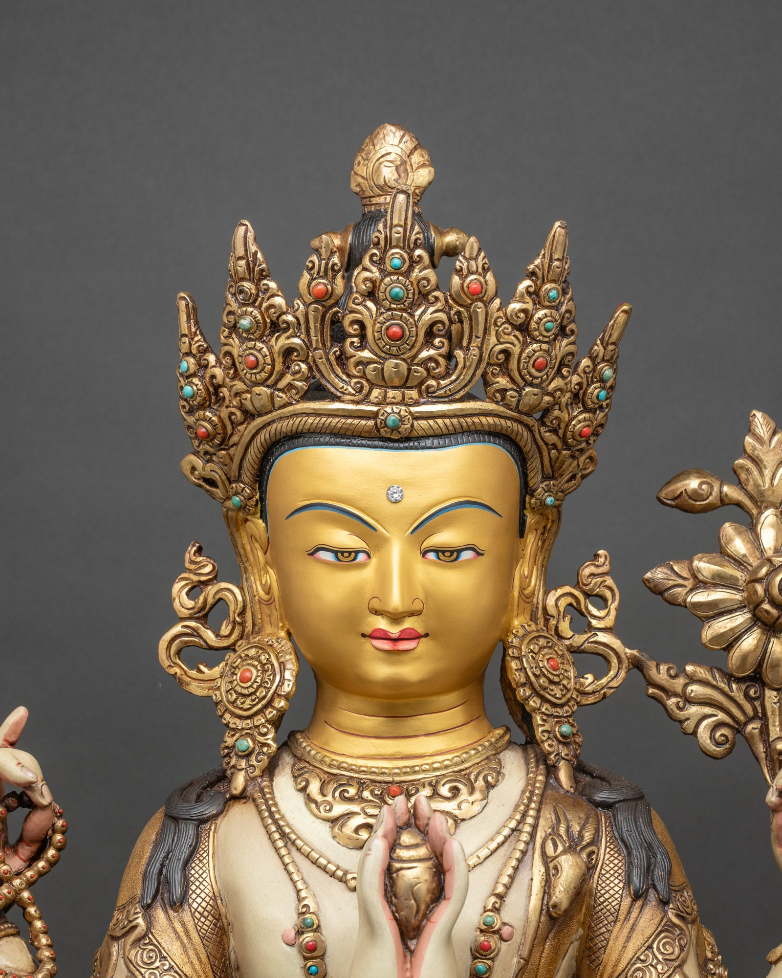 Chenrezig Statue regular close-up, detailed copper and gold Avalokiteshvara sculpture