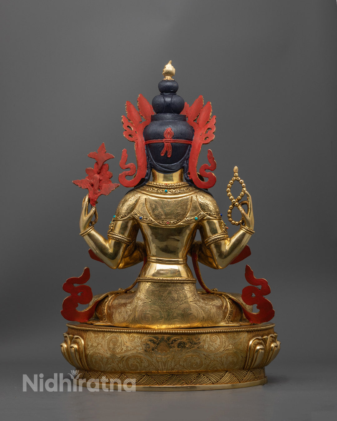 Chenrezig Bodhisattva statue in gold gilded copper, highlighting the sacred iconography and masterful craftsmanship.