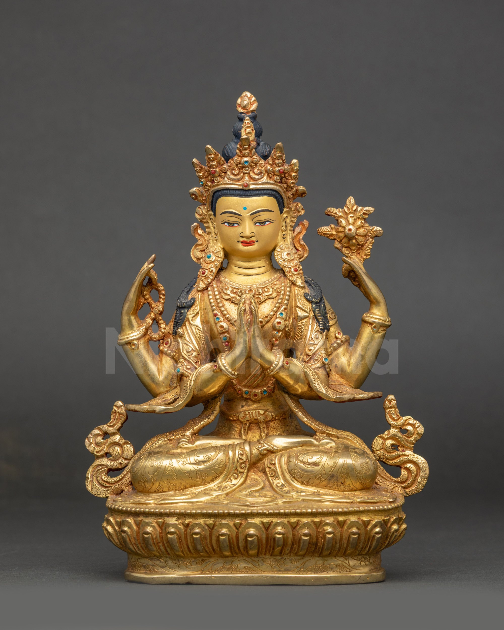 Chenrezig Buddha statue front view with gold face on lotus seat