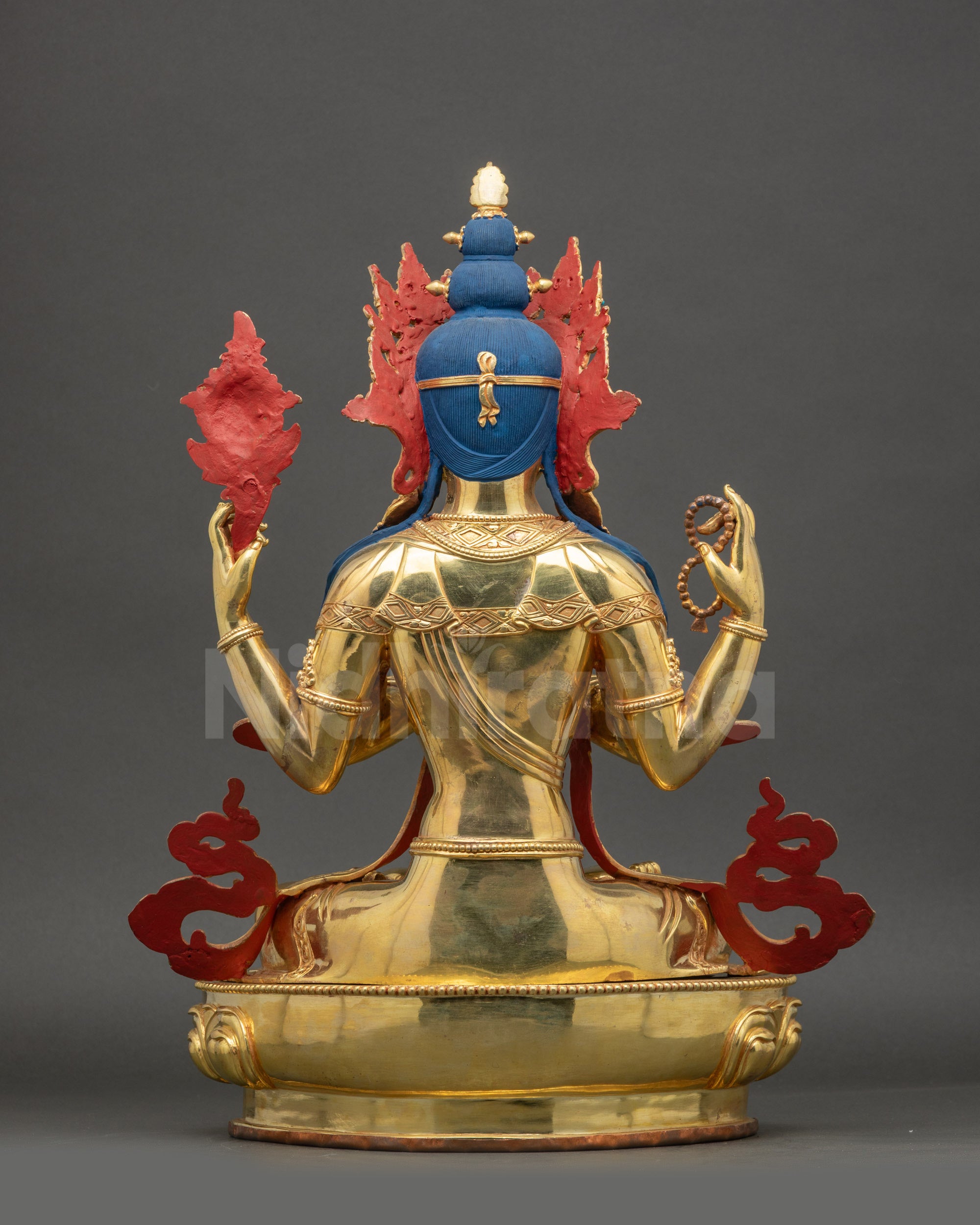 Chenrezig Statue Back View Showing Intricate Lower Garments and Robe