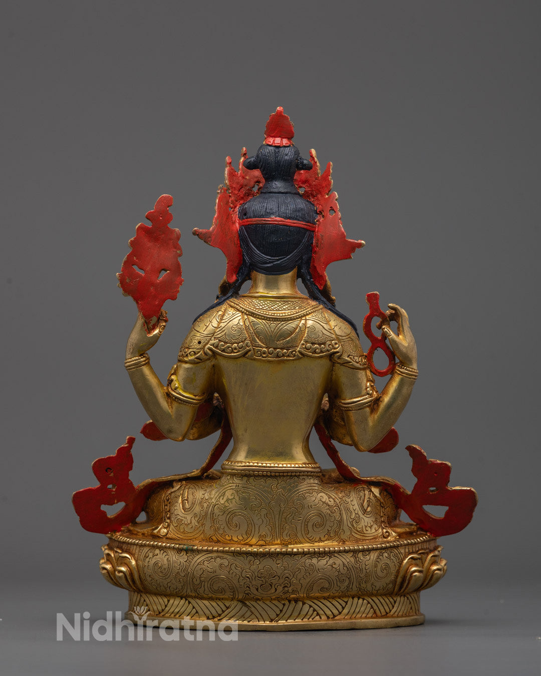 Chenrezig Statue displayed on a meditation altar representing Tibetan Buddhist