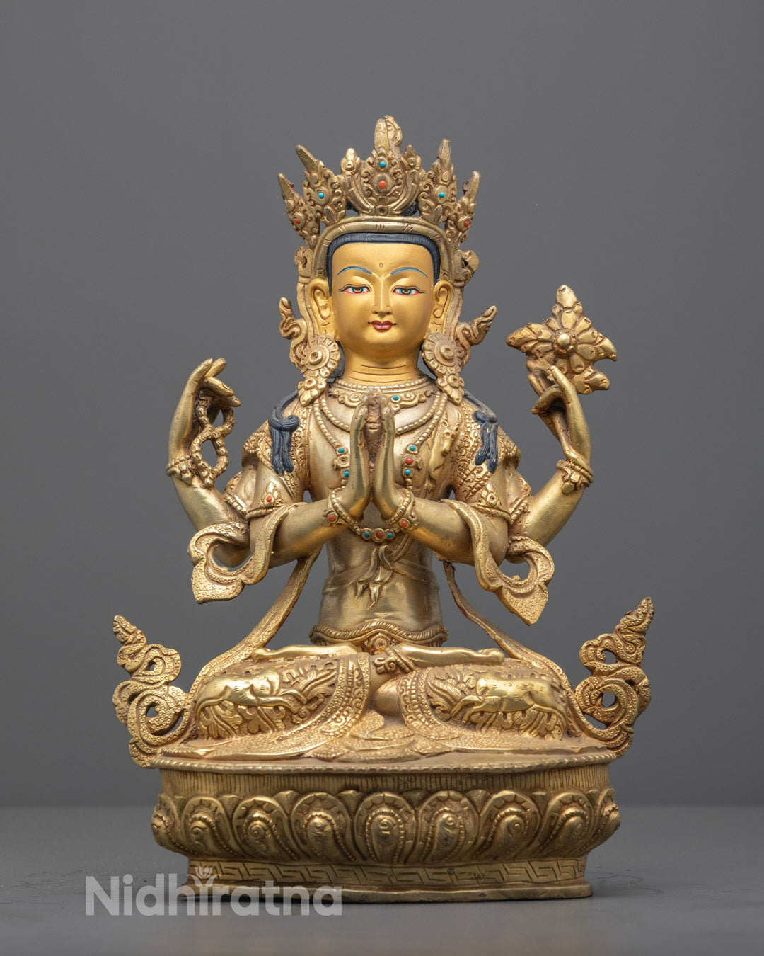 Chenrezig Statue with 24k gold and stones on lotus throne, handcrafted in Nepal.