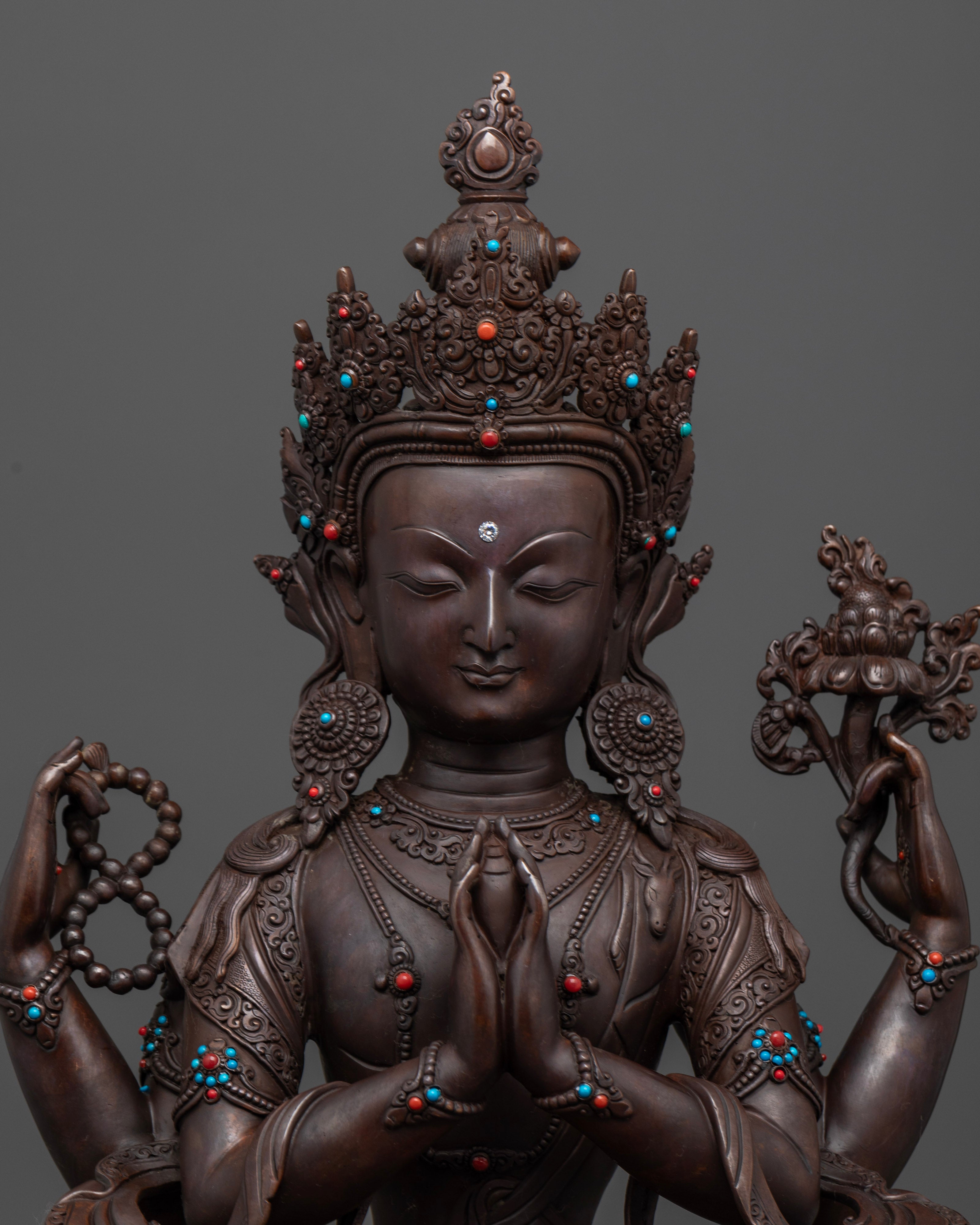 face of brown Chenrezig statue
