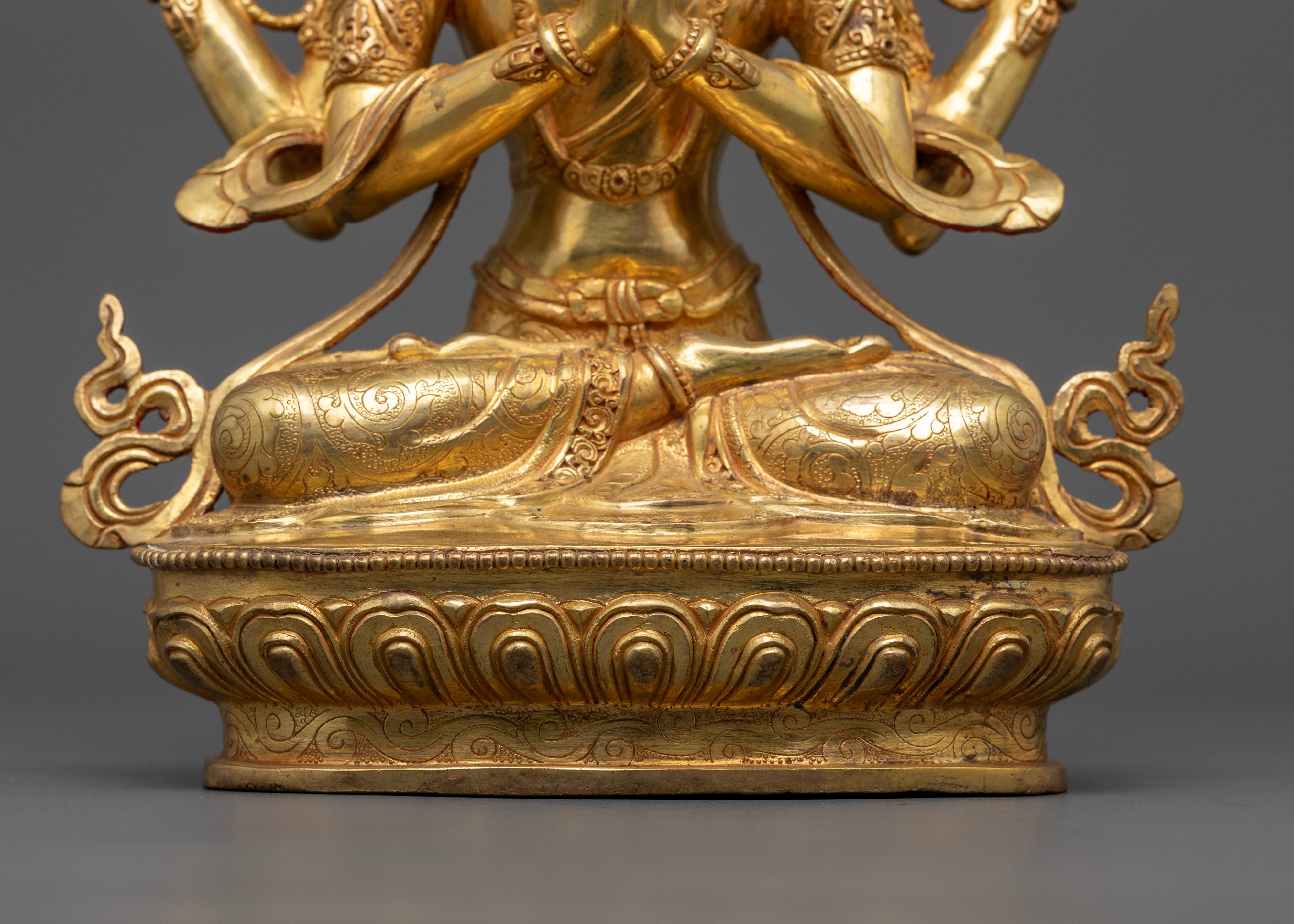 golden chenrezig statue sitting with crossed leg | Avalokiteshvara four-armed statue | Kwan-Yin statue