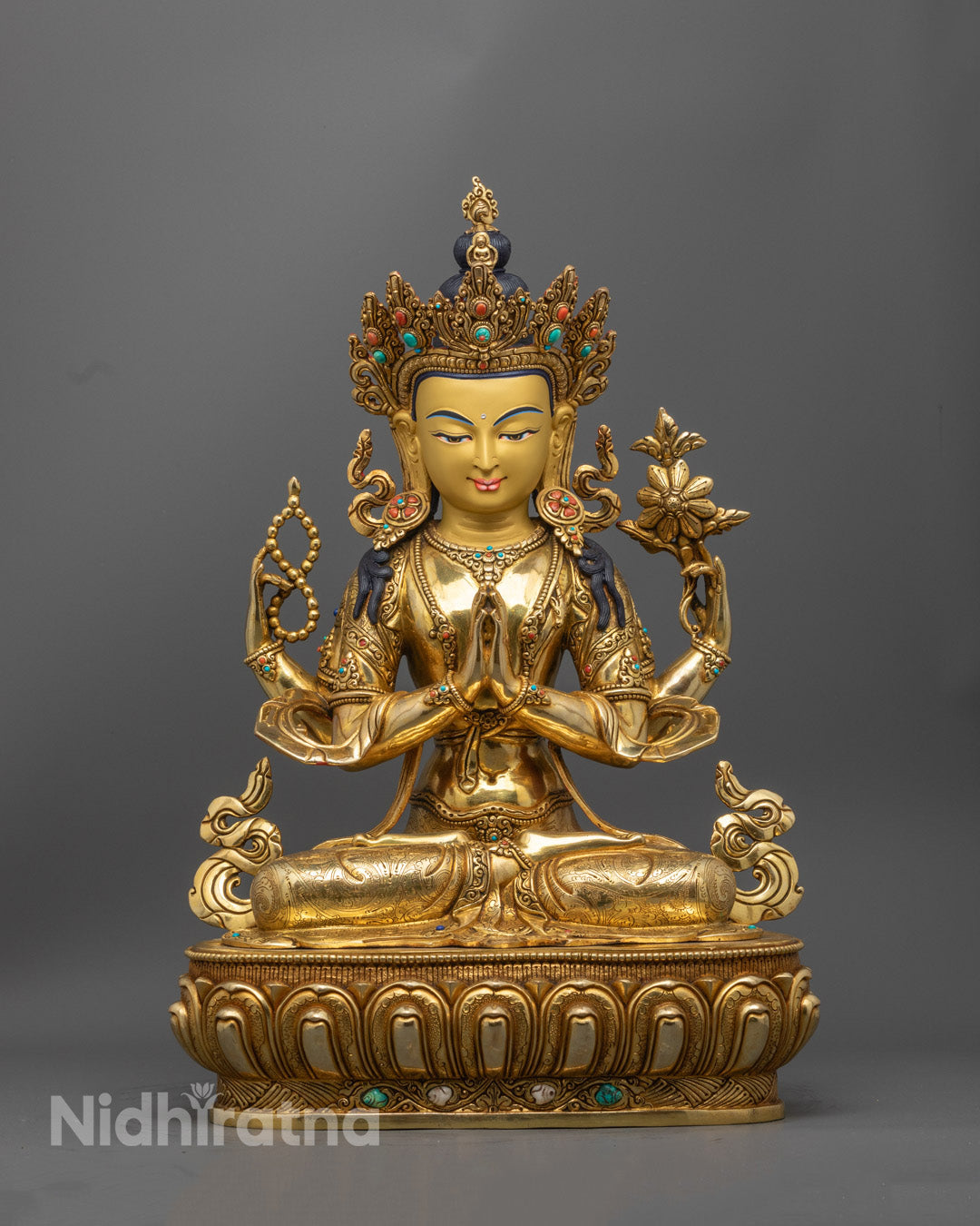Handcrafted Chenrezig statue in 24K gold gilded copper | Tibetan Buddha of Compassion seated in serene meditation.