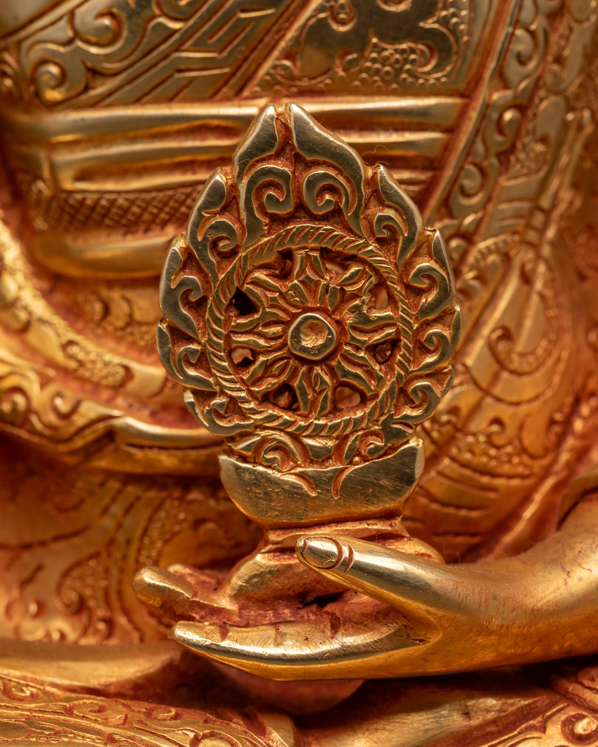 Chogyal Phagpa statue presenting a dharma wheel for peace.