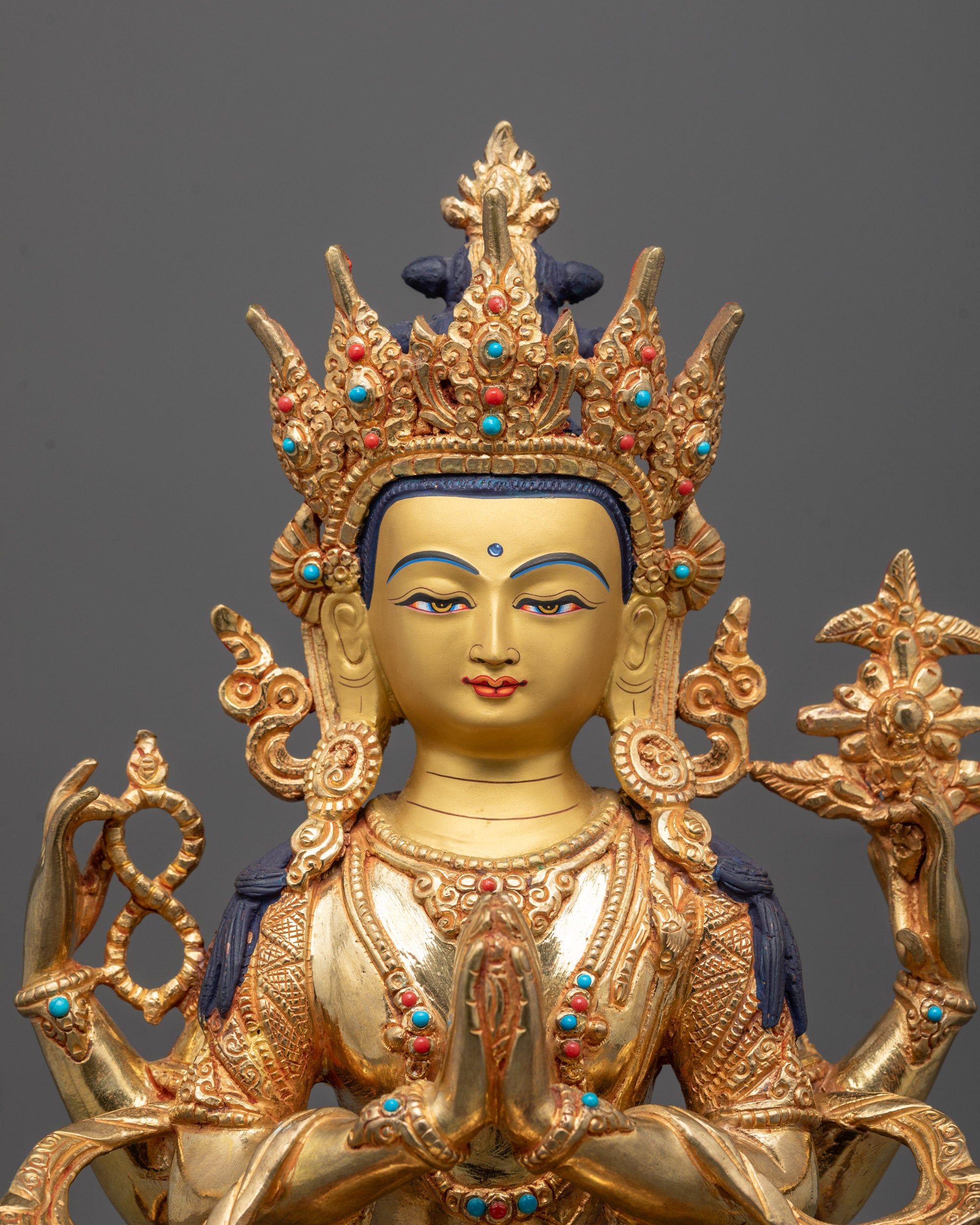Close-Up of 24k Fire-Gilded Chenrezig Face Showing Serene Expression