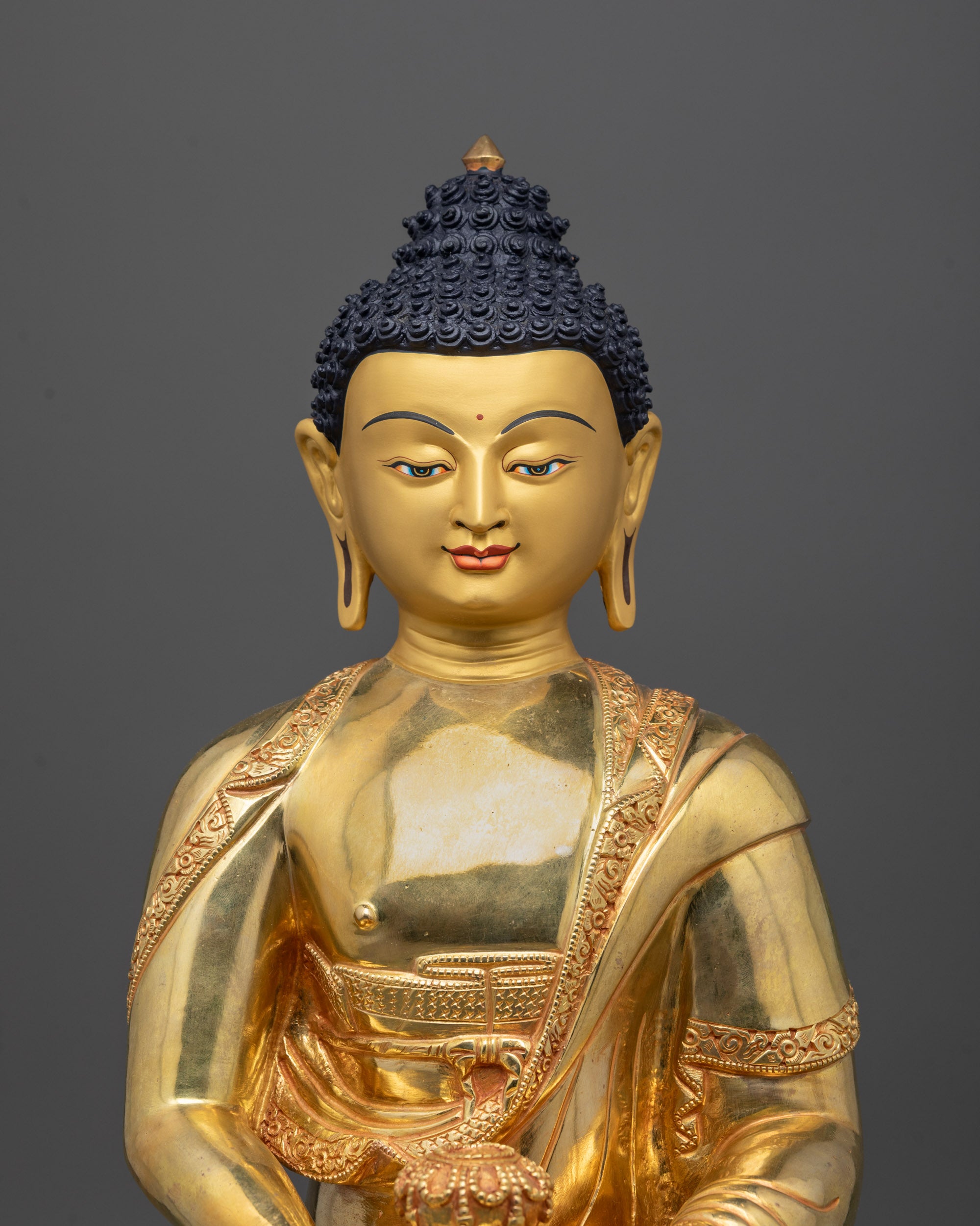 Close-Up of Amitabha Buddha’s Serene Face and Detailed Crown