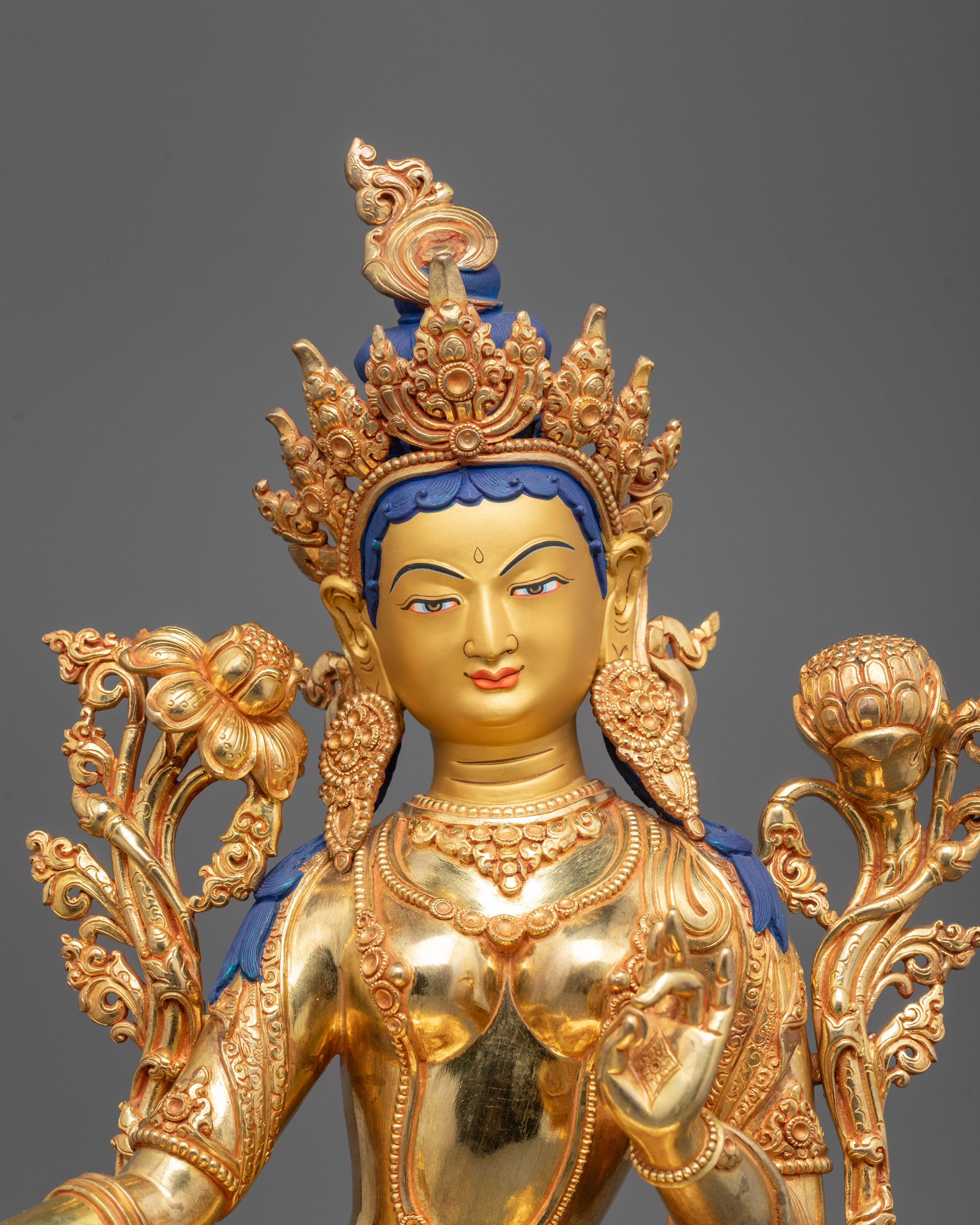 Close-Up of Green Tara’s Gold-Gilded Face with Intricate Acrylic Color Detailing