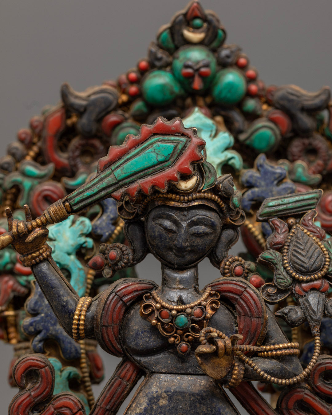 Close-Up of Manjushri’s Face and Intricate Crown Adorned with Semi-Precious Stones