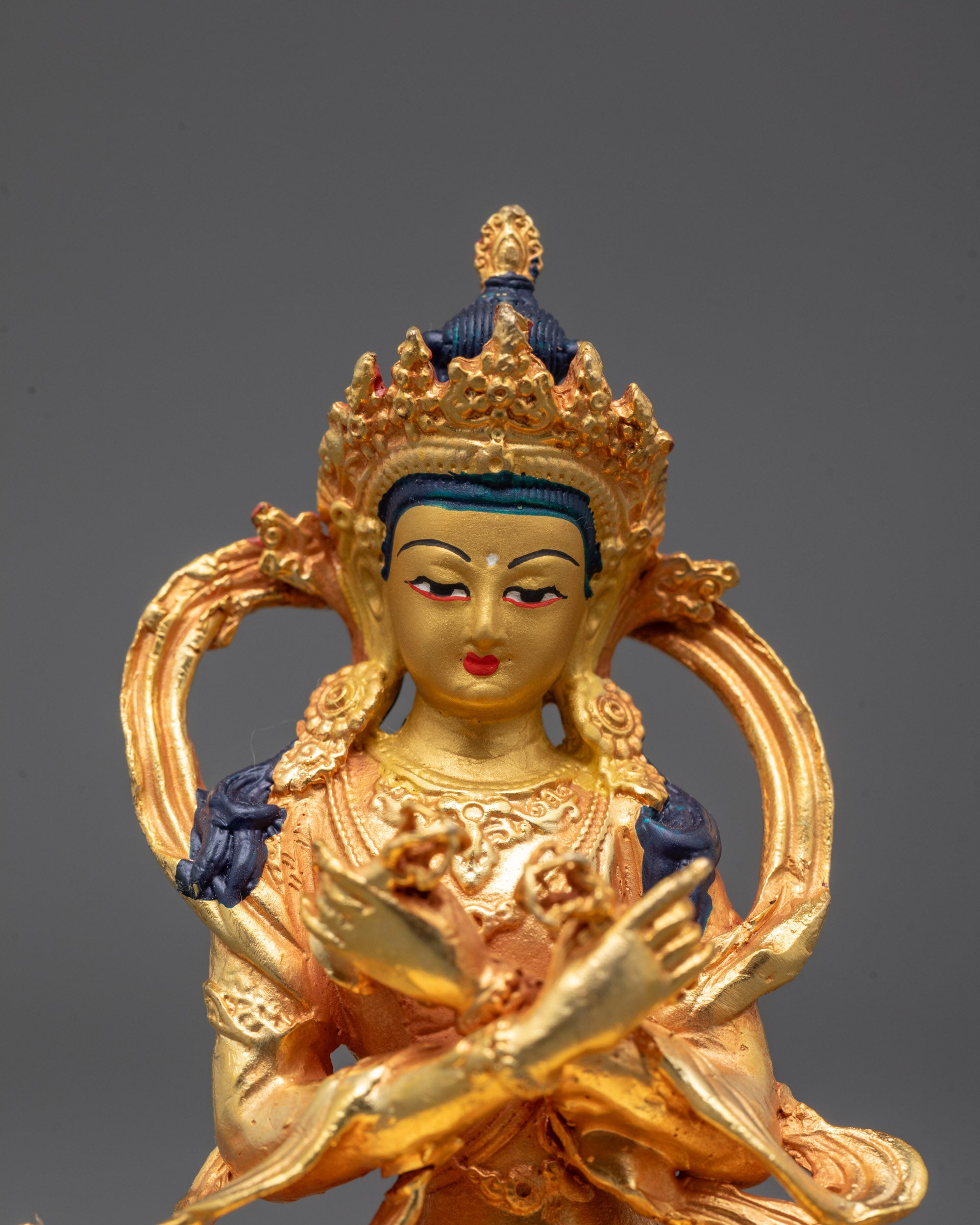 Close-Up of Vajradhara Statue Face and Ornamental Detail