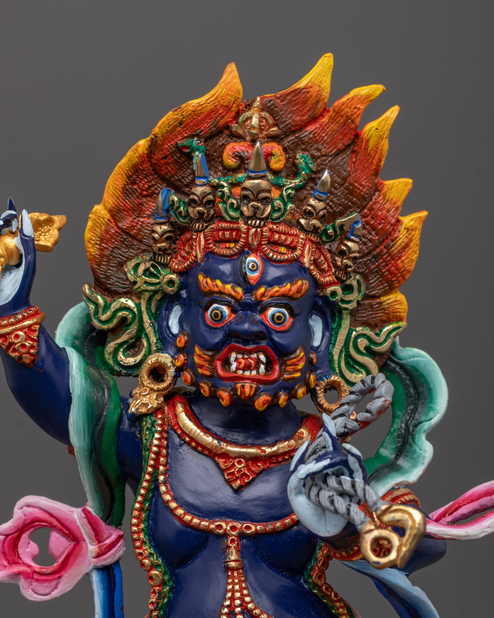Close-Up of Vajrapani’s Wrathful Expression and Vajra Weapon