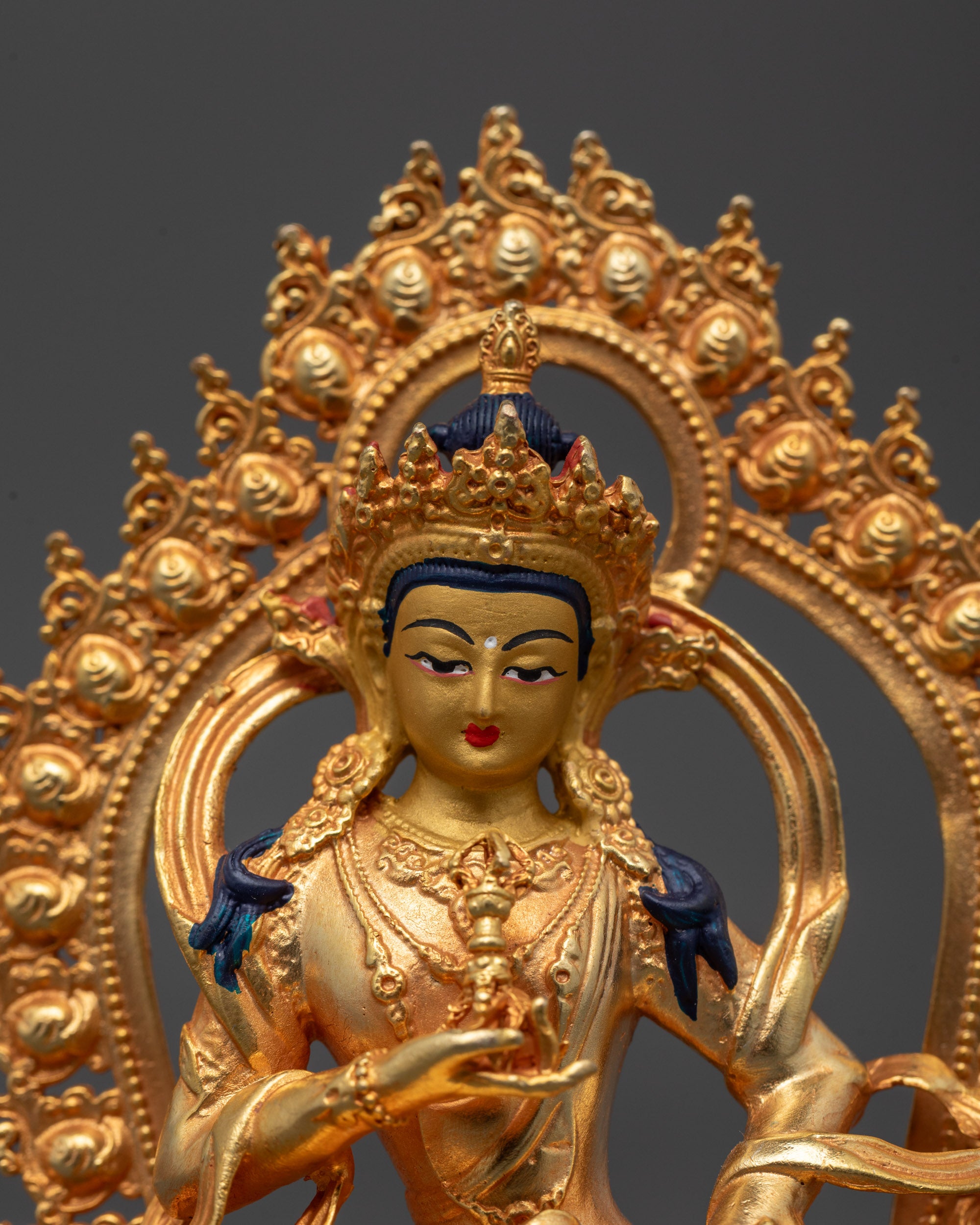 Close-Up of Vajrasattva Holding Vajra and Bell Symbolizing Purification