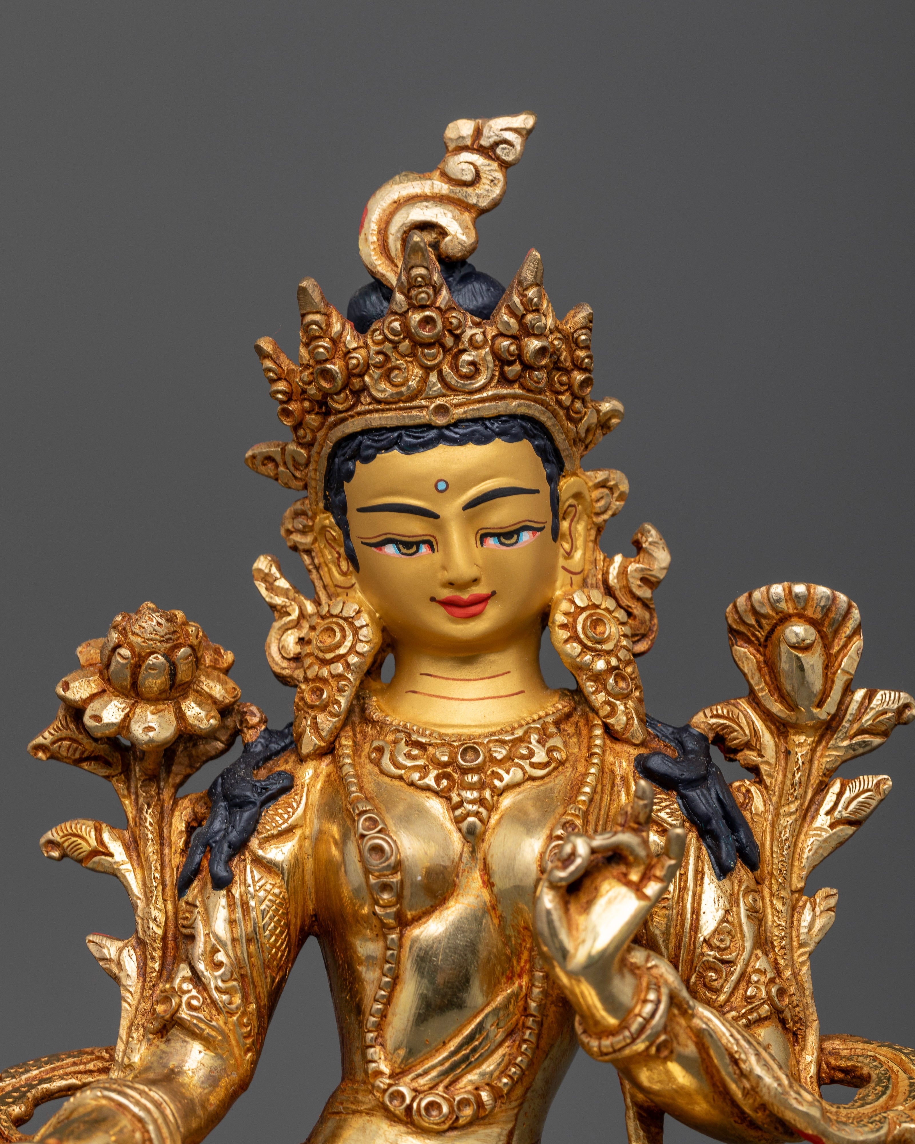 Close up Green Tara sculpture ornate crown aureole halo Himalayan craftsmanship Buddhist art