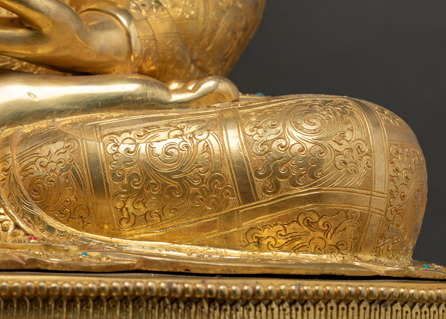 Close-up of hand-carved double lotus throne base of Shakyamuni Buddha statue