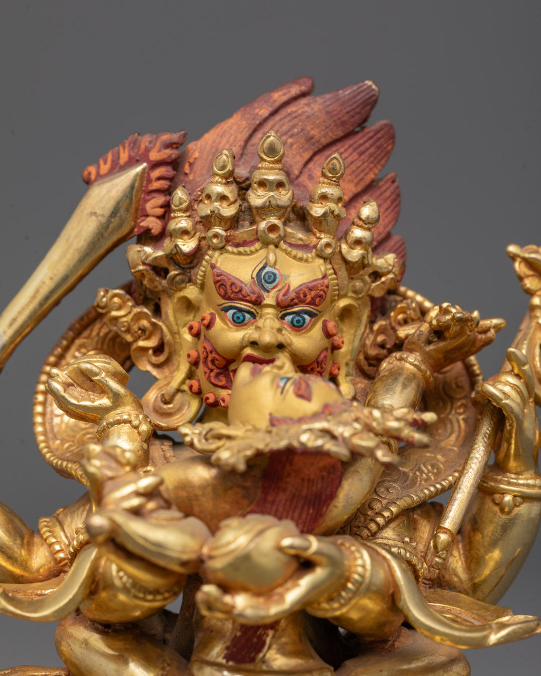 Close-up of 4 Armed Mahakala Face | Detailed view of gold-gilded face