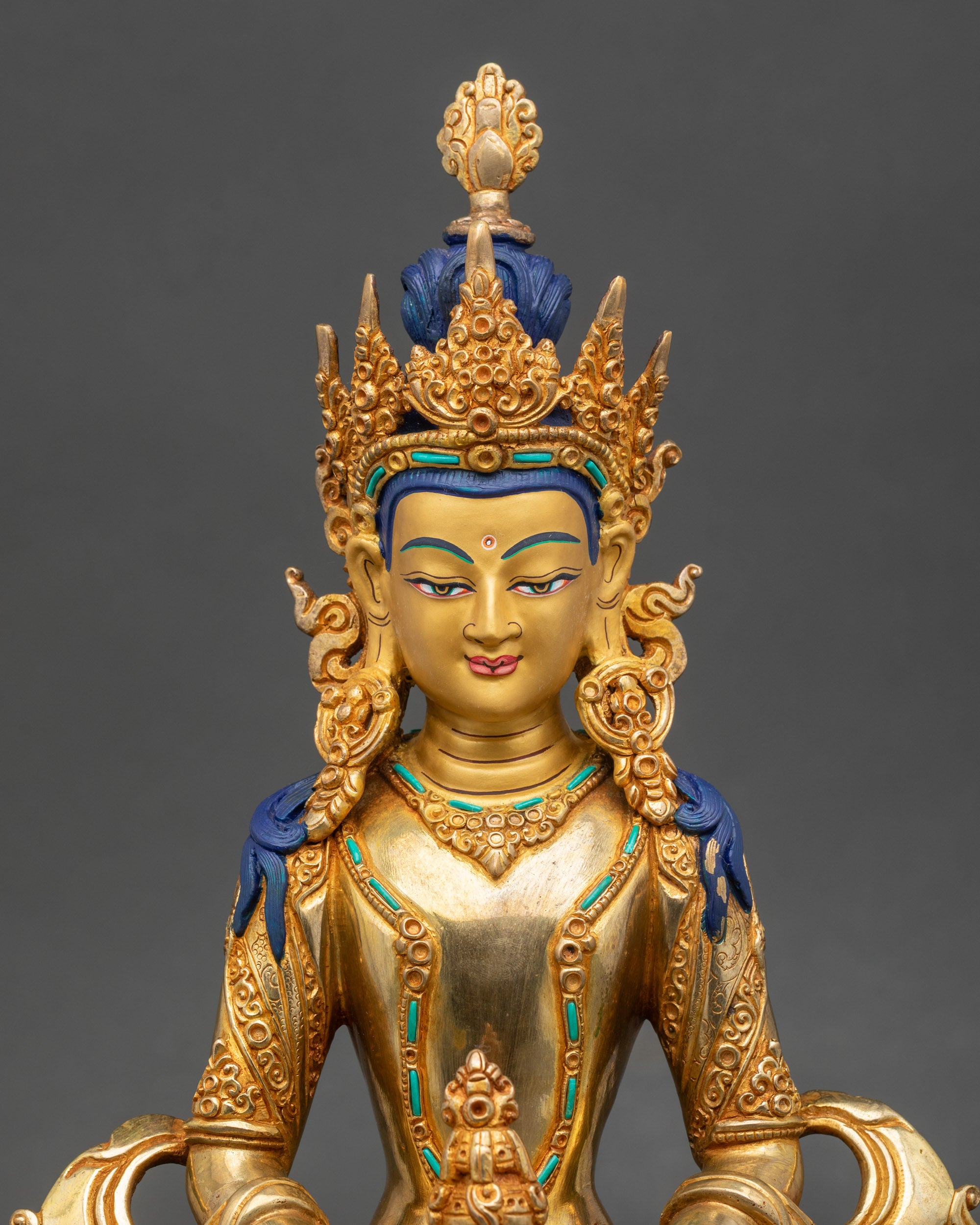 Close-up of Amitayus Buddha holding medicinal vase, painted with acrylic colors