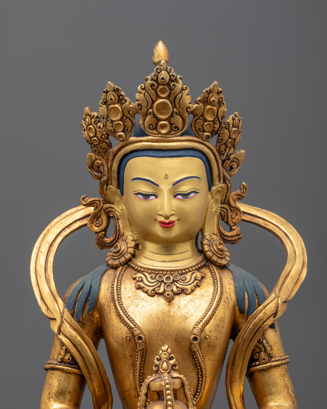 Close-up of Amitayus face with 5-jeweled crown and gold-gilded features
