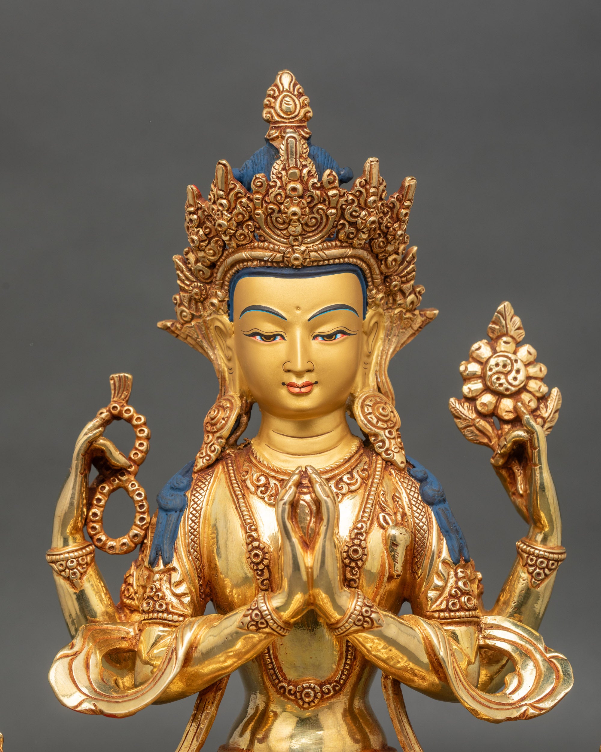 Close-up of Chenrezig Avalokiteshvara statue showing intricate Newari craftsmanship and gilded details