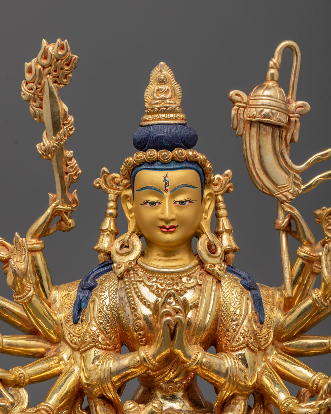Close-up of Cundi Bodhisattva Statue showing detailed 24K gold-gilded serene face