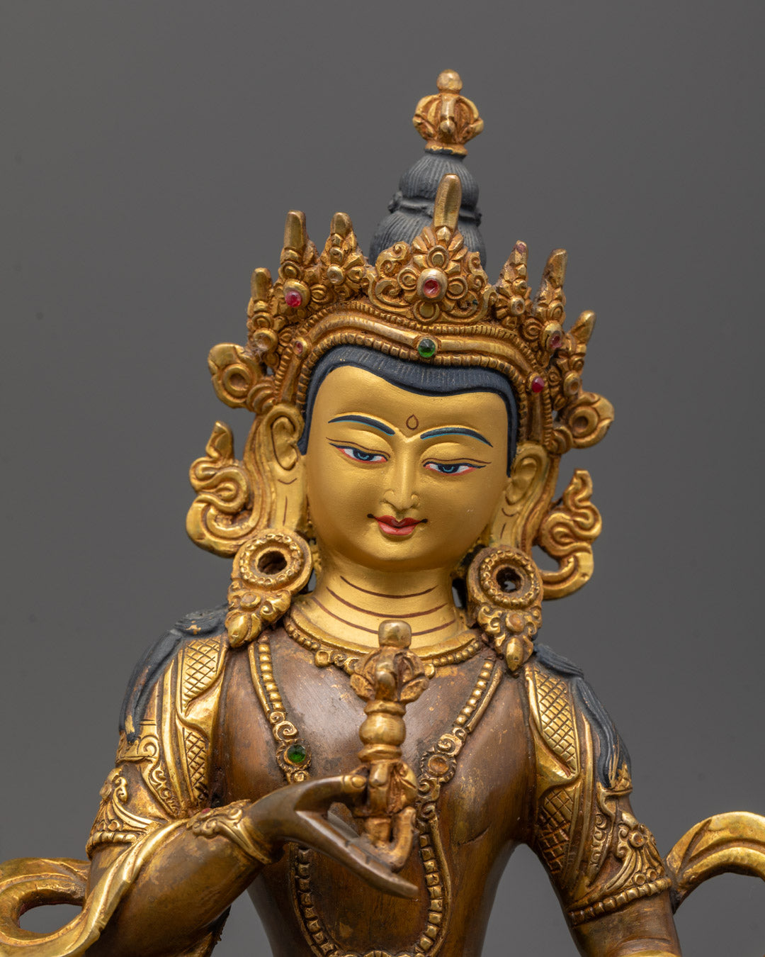 Close-up of Dorje Sempa’s detailed face and intricate craftsmanship