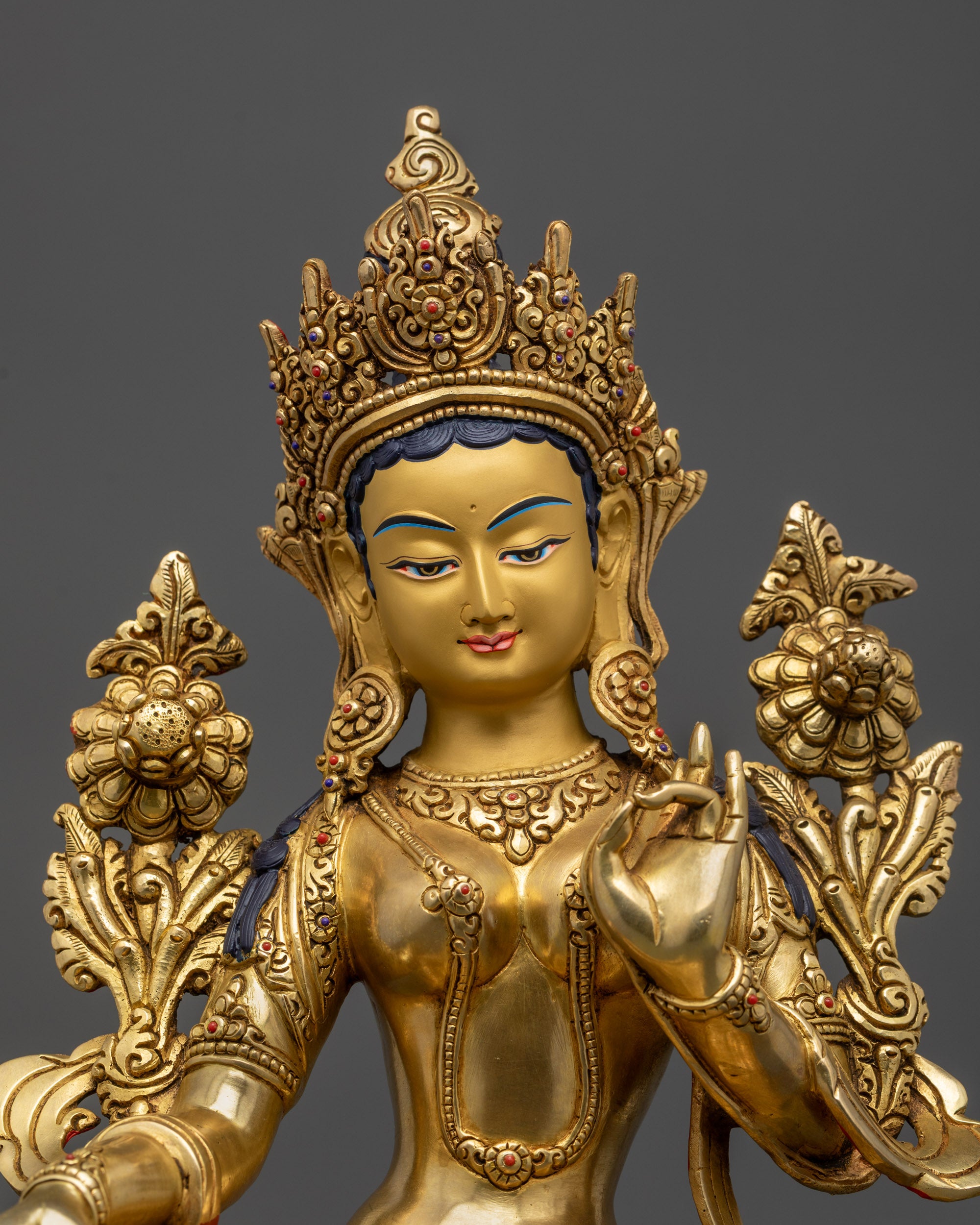 Close-up of Green Tara’s Serene Expression with Five-Jeweled Crown and Utpala Flower