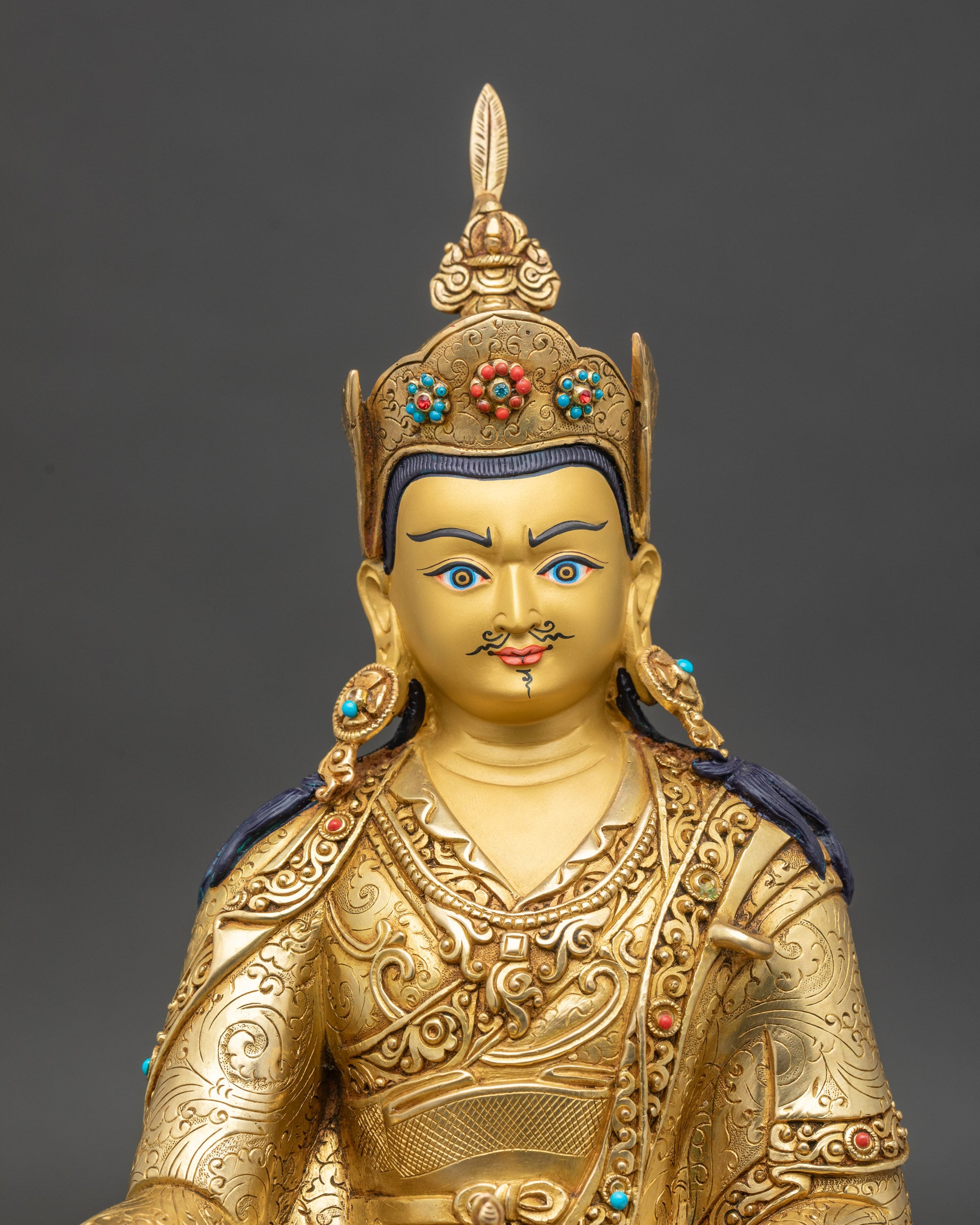 Close-up of Guru Padmasambhava Statue showing intricate Himalayan craftsmanship details