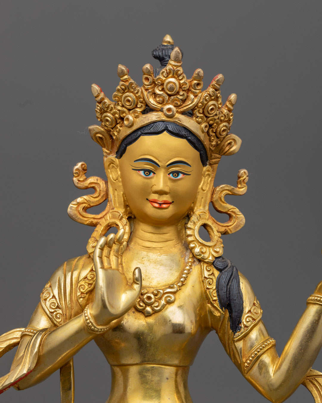 Mandarva and Yeshe Tsogyal statues with vibrant acrylic colors and gold fire gilding, handmade in Nepal by master artisans.
