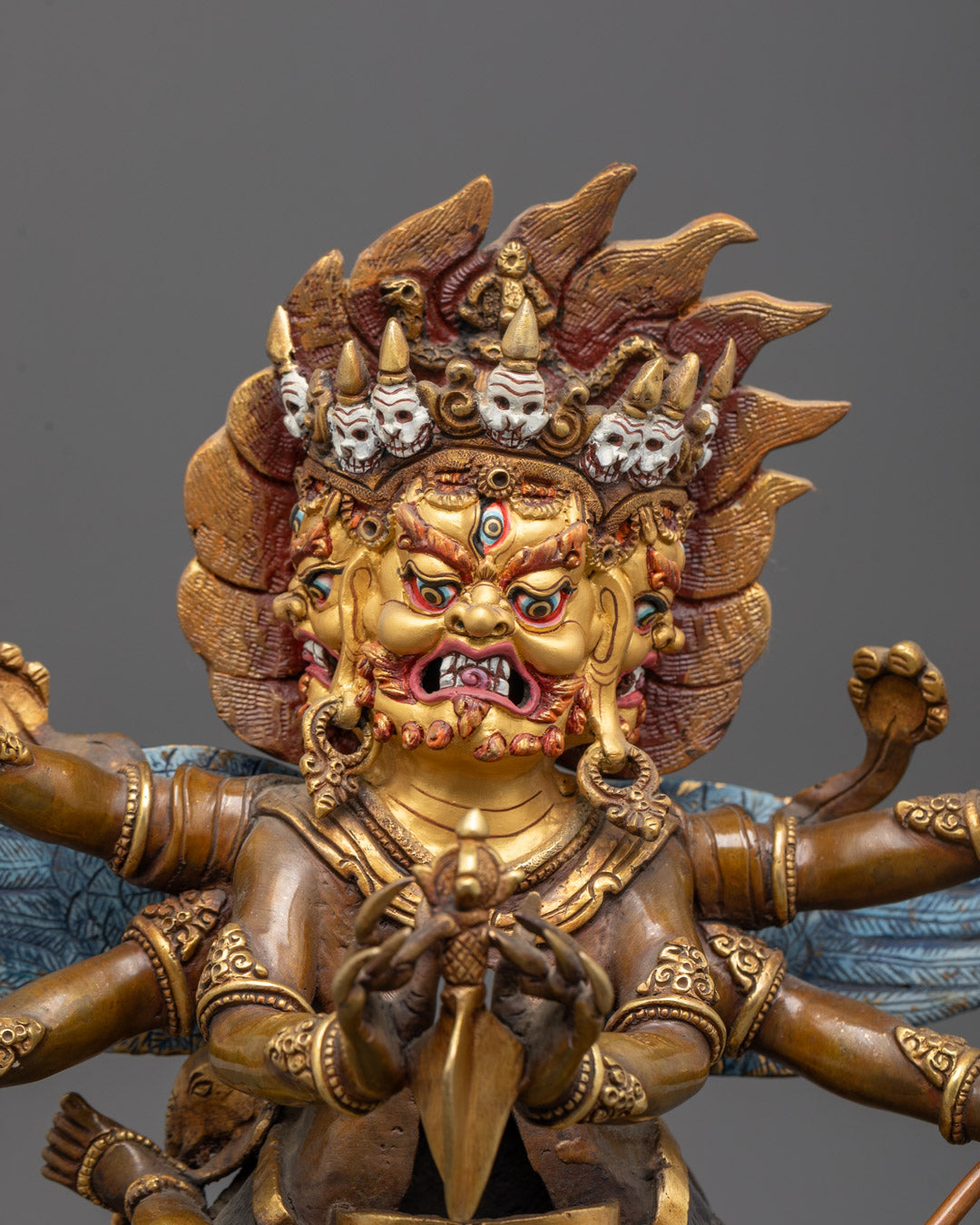 Close-up of Vajrakilaya Face with Gold Gilding and Hand-Carved Expressions