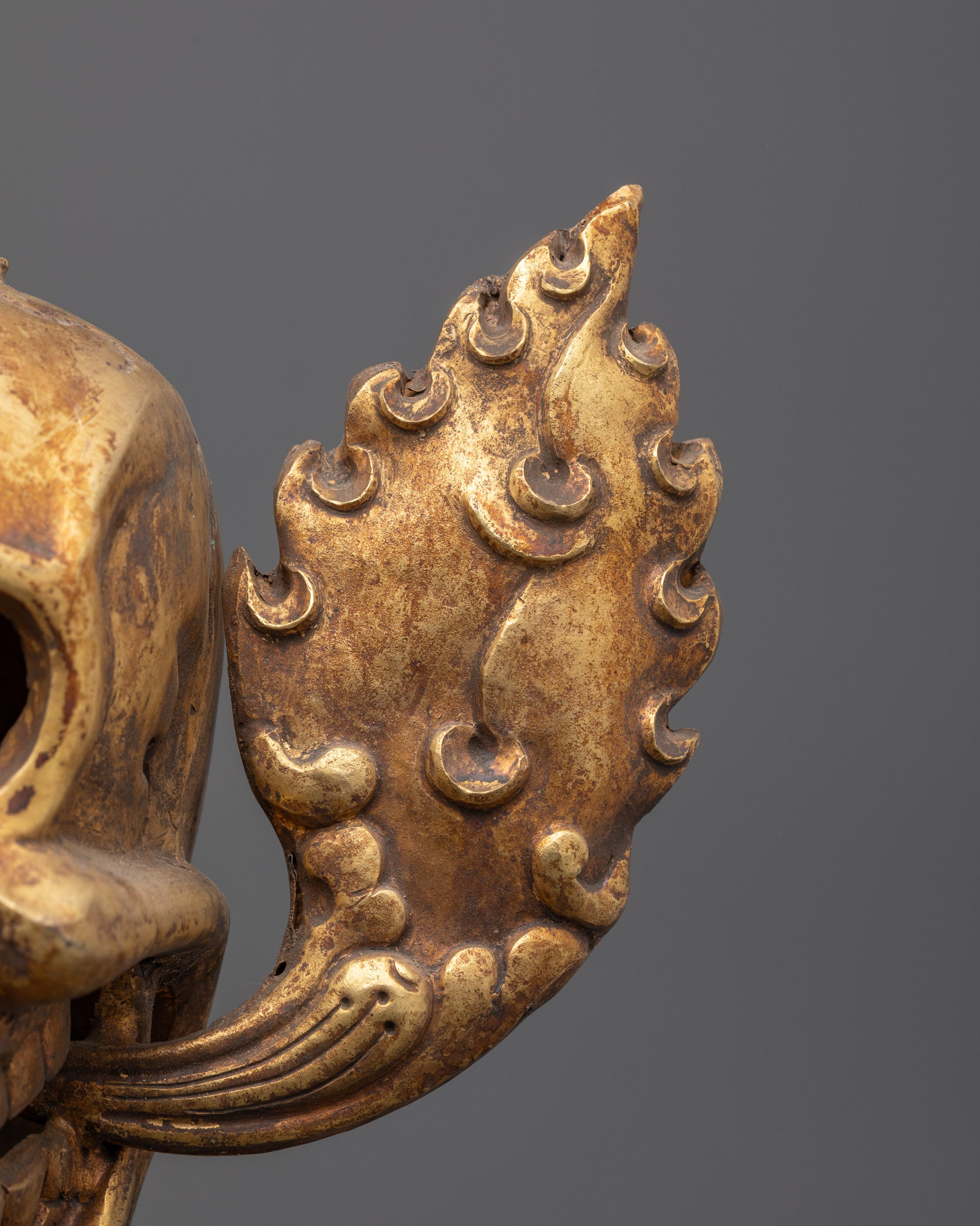 Close-up of intricate carvings on handcrafted Himalayan Citipati skull