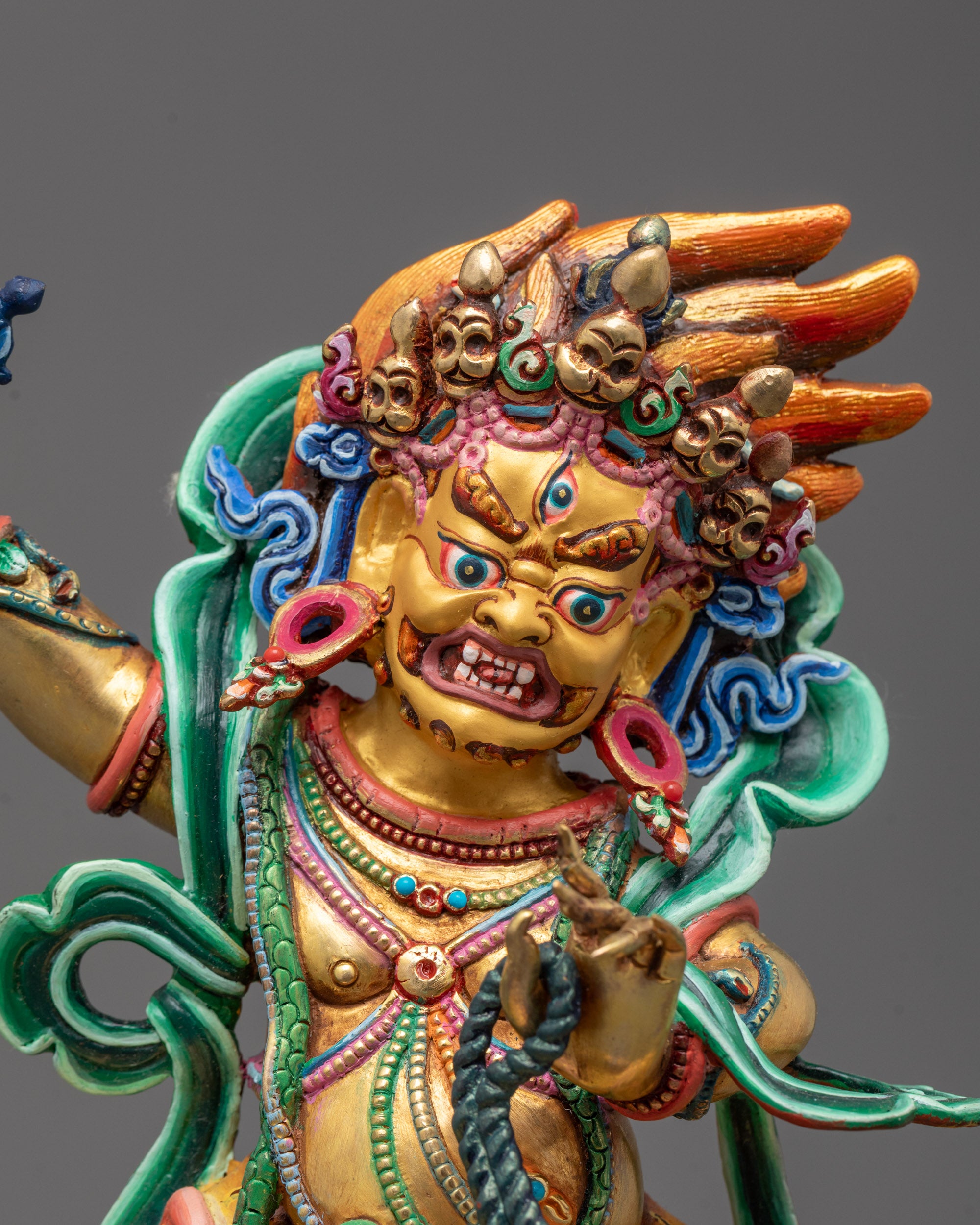 Close-up of the intricate details on a copper Chana Dorje Statue polished with gold amalgam