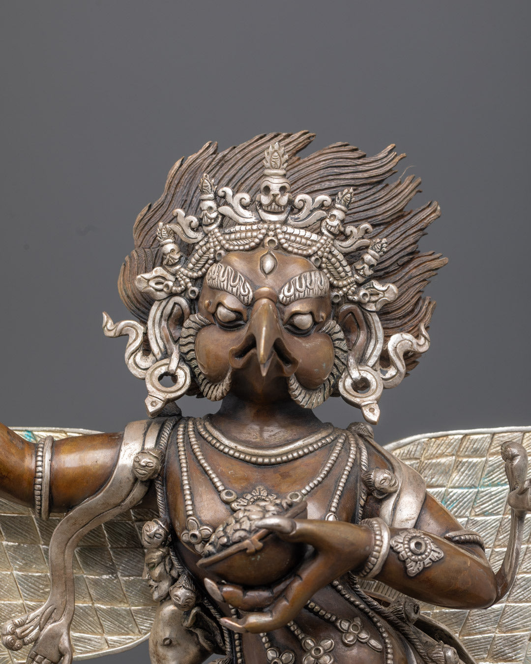 Acrylic-painted Garuda statue featuring fierce expression and traditional Nepalese craftsmanship