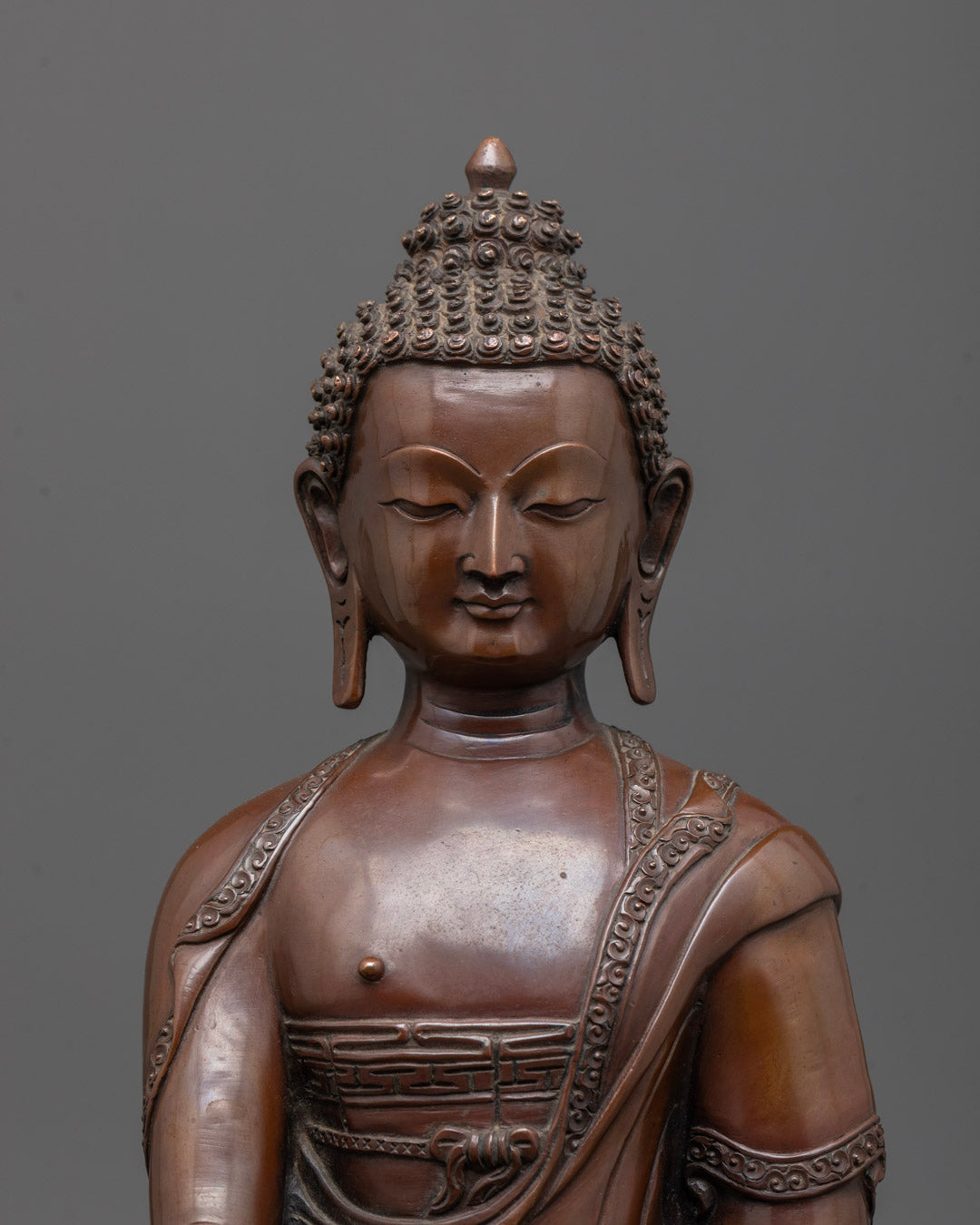 Close-up view of Siddhartha Gautama Buddha statue showcasing intricate craftsmanship