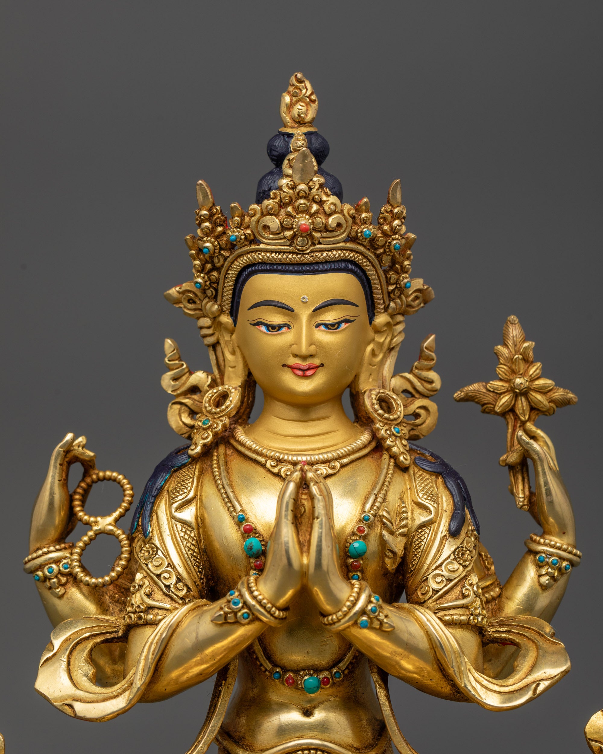 Close up Chenrezig Bodhisattva face with serene expression and crown
