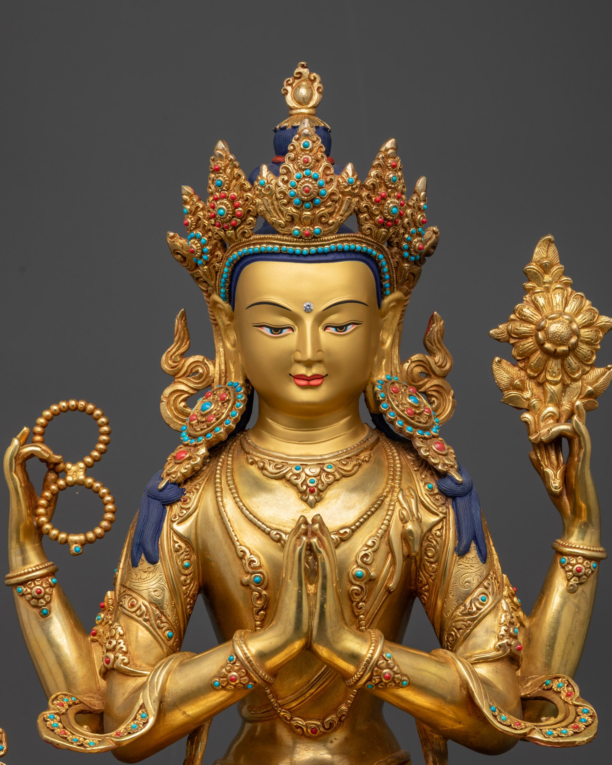 Close up Chenrezig crown and wish-fulfilling gem with semi-precious stones