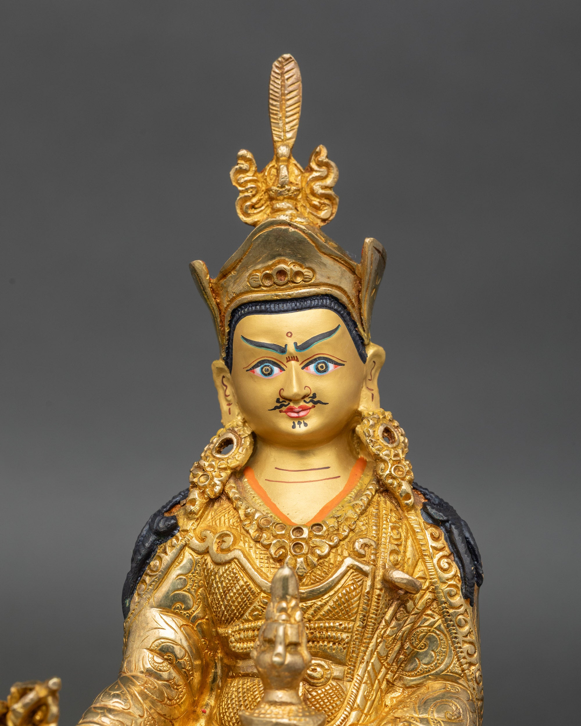 Close up Guru Rinpoche – hand-crafted Newari artistry with vajra, kalash, and khatvanga