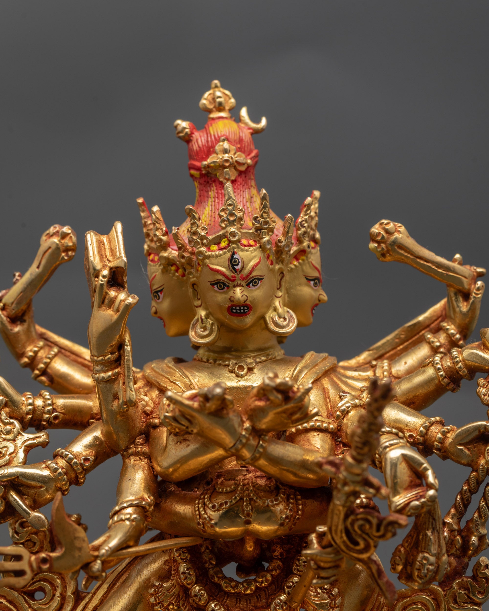 Close up Heruka Chakrasamvara three heads with crown and eyes on forehead detailed face