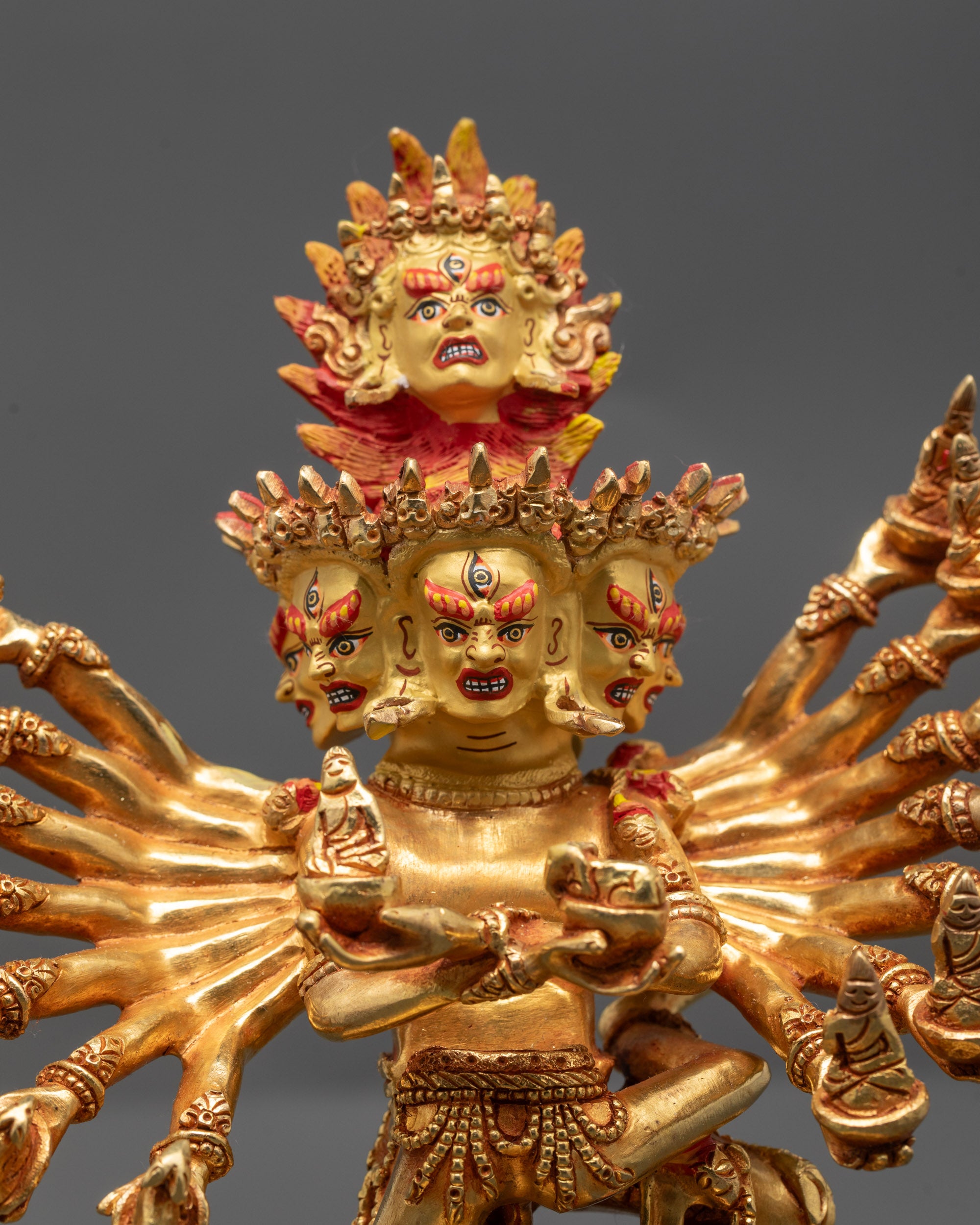 Close up Hevajra Yab Yum Statue showing semi-wrathful face with crown and jewelry