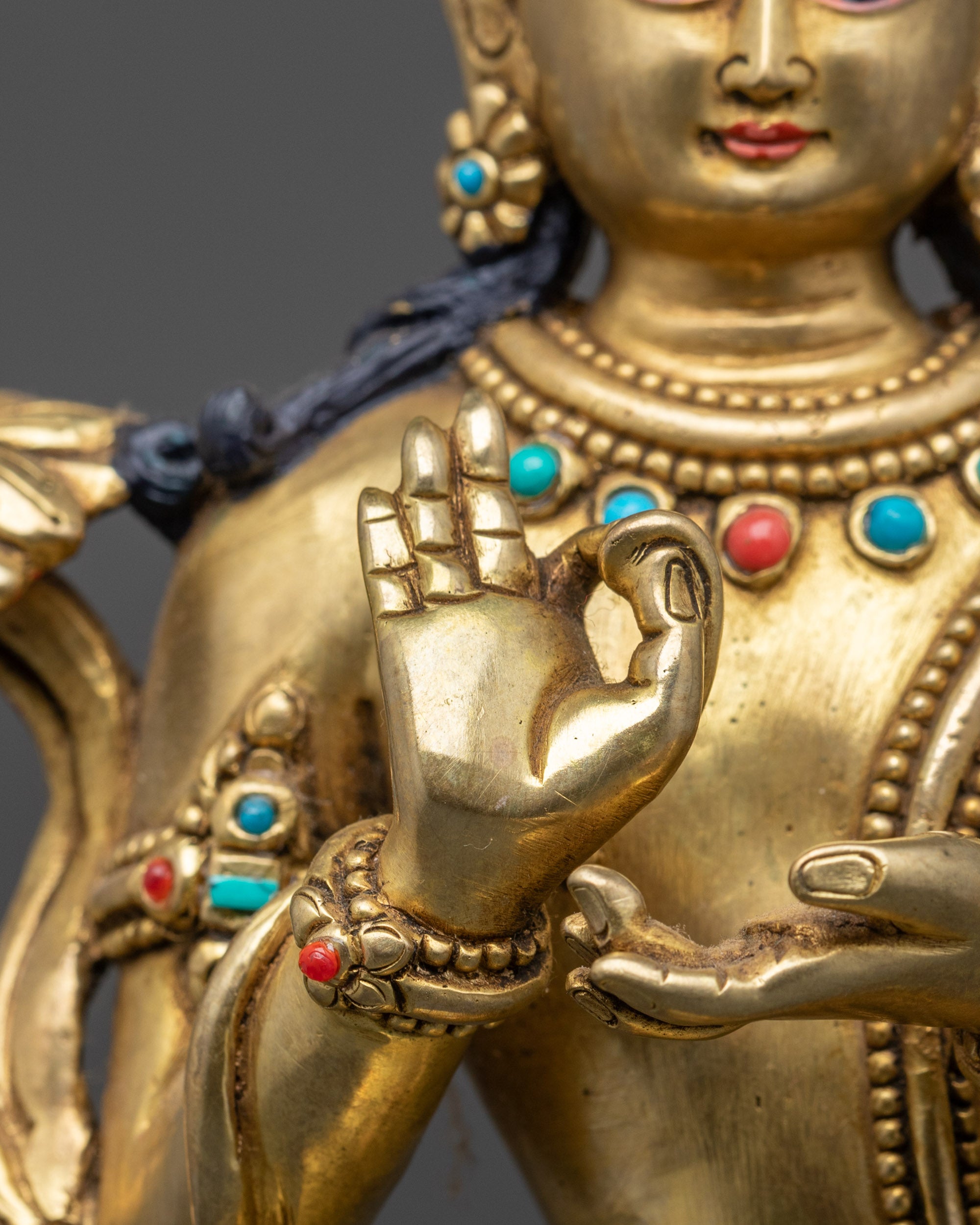 Close up Kshitigarbha showing gold-fire gilded base and ornate crown detail